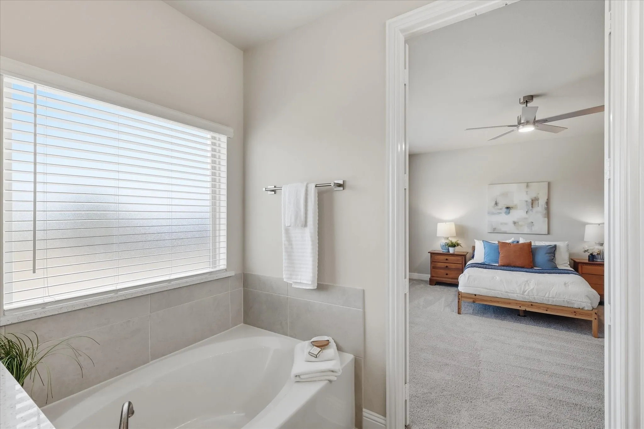 1st floor primary ensuite bath featuring a soaking tub, seperate shower with rainfall head, dual sinks, great vanity and walk in closet!
