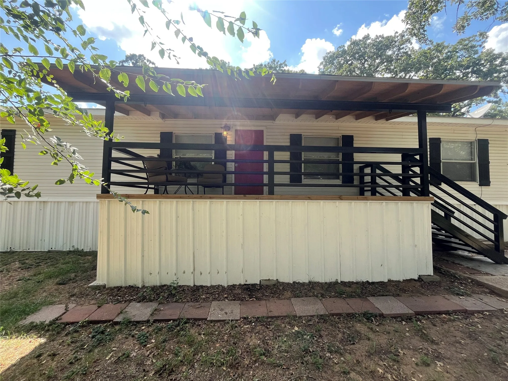 Heavy Duty Steel Rails and Steps to Front Door/Porch.