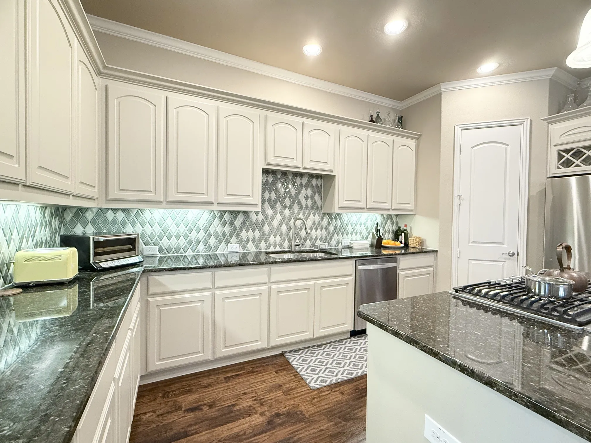 Kitchen with stainless-steel appliances