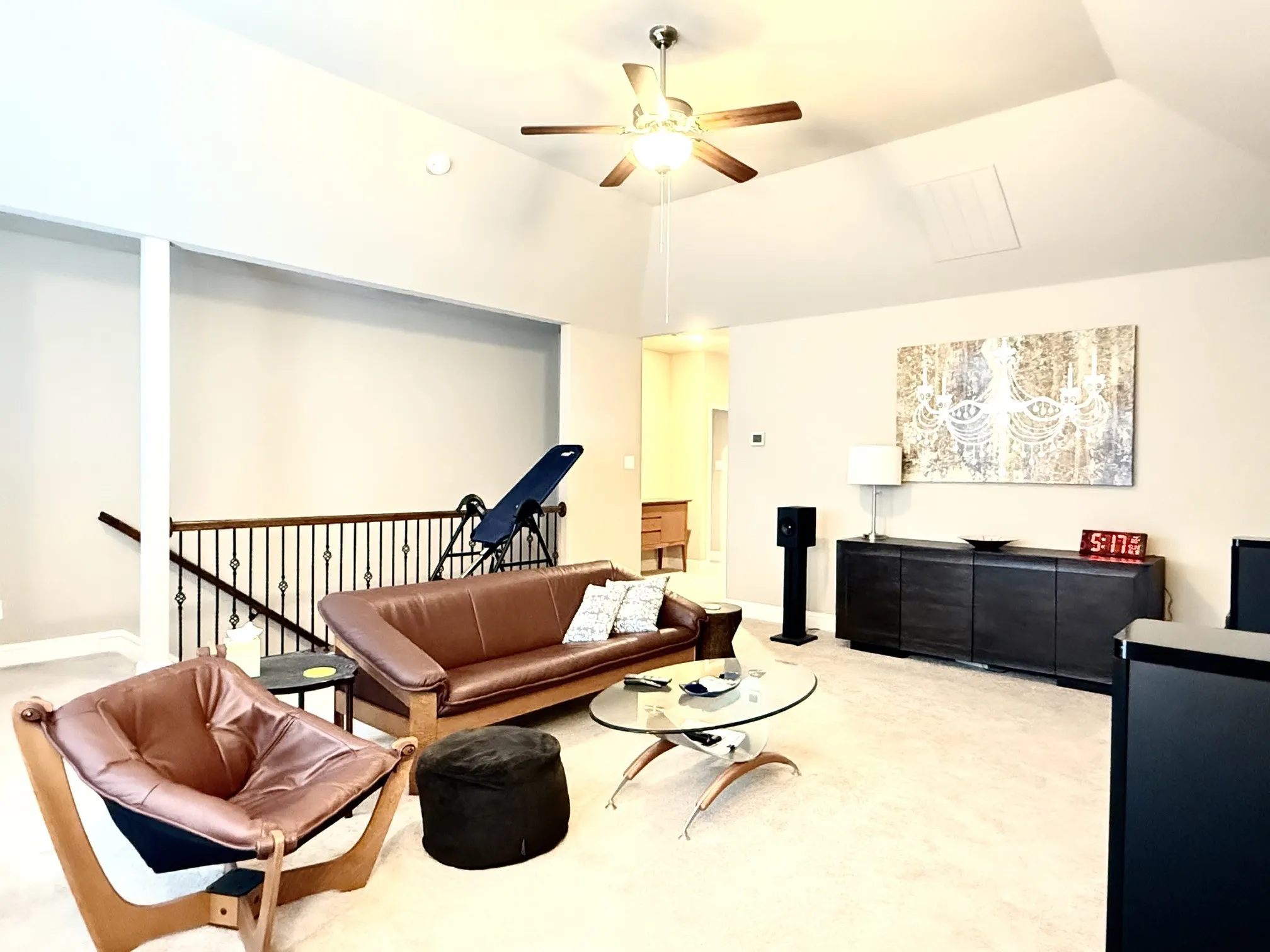Upstairs living with ceiling fan