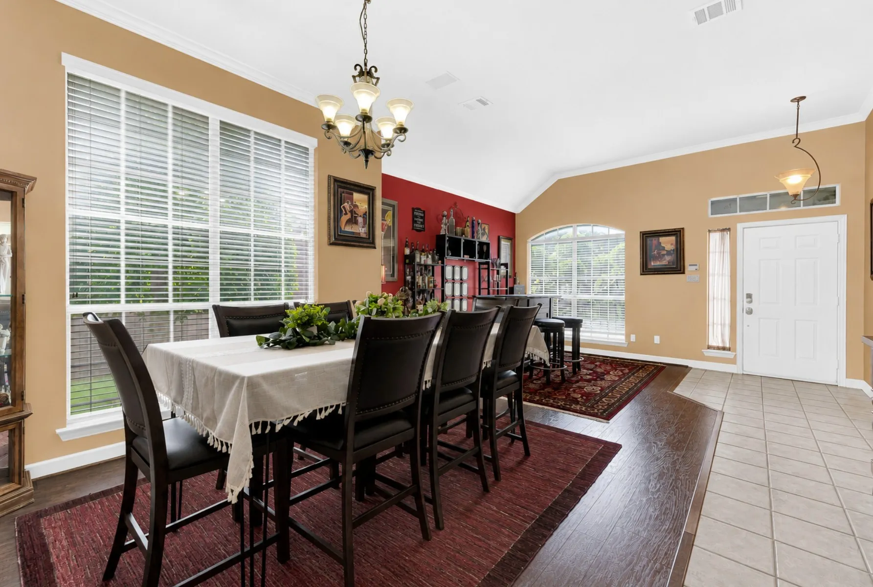 A graceful arched entryway opens seamlessly into a wide-open floor plan designed for effortless movement. You can easily imagine hosting lively weekend get-togethers where friends gather and conversation flows freely.