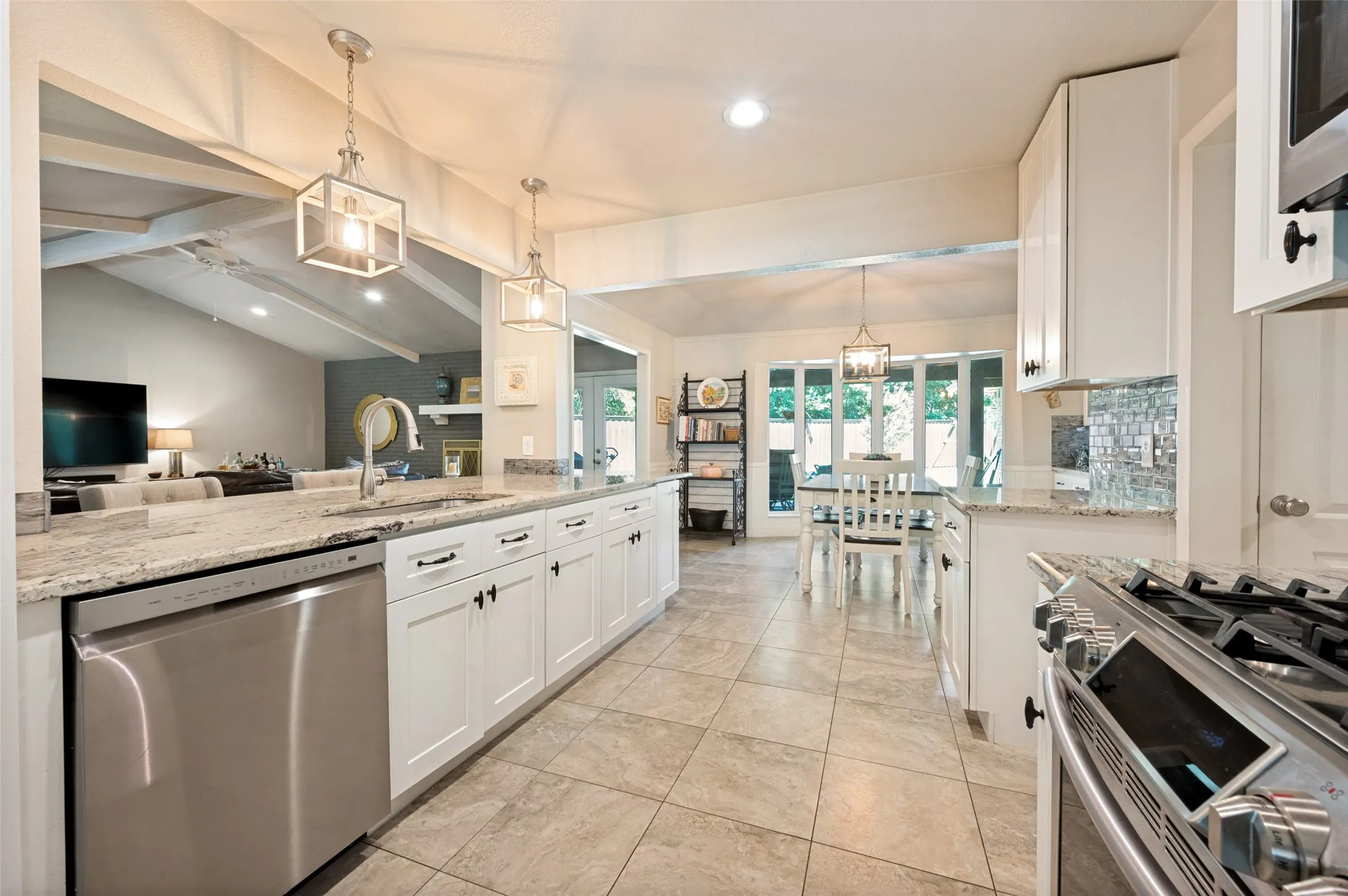 Granite Counter, Porcelain tile flooring, SS appliances