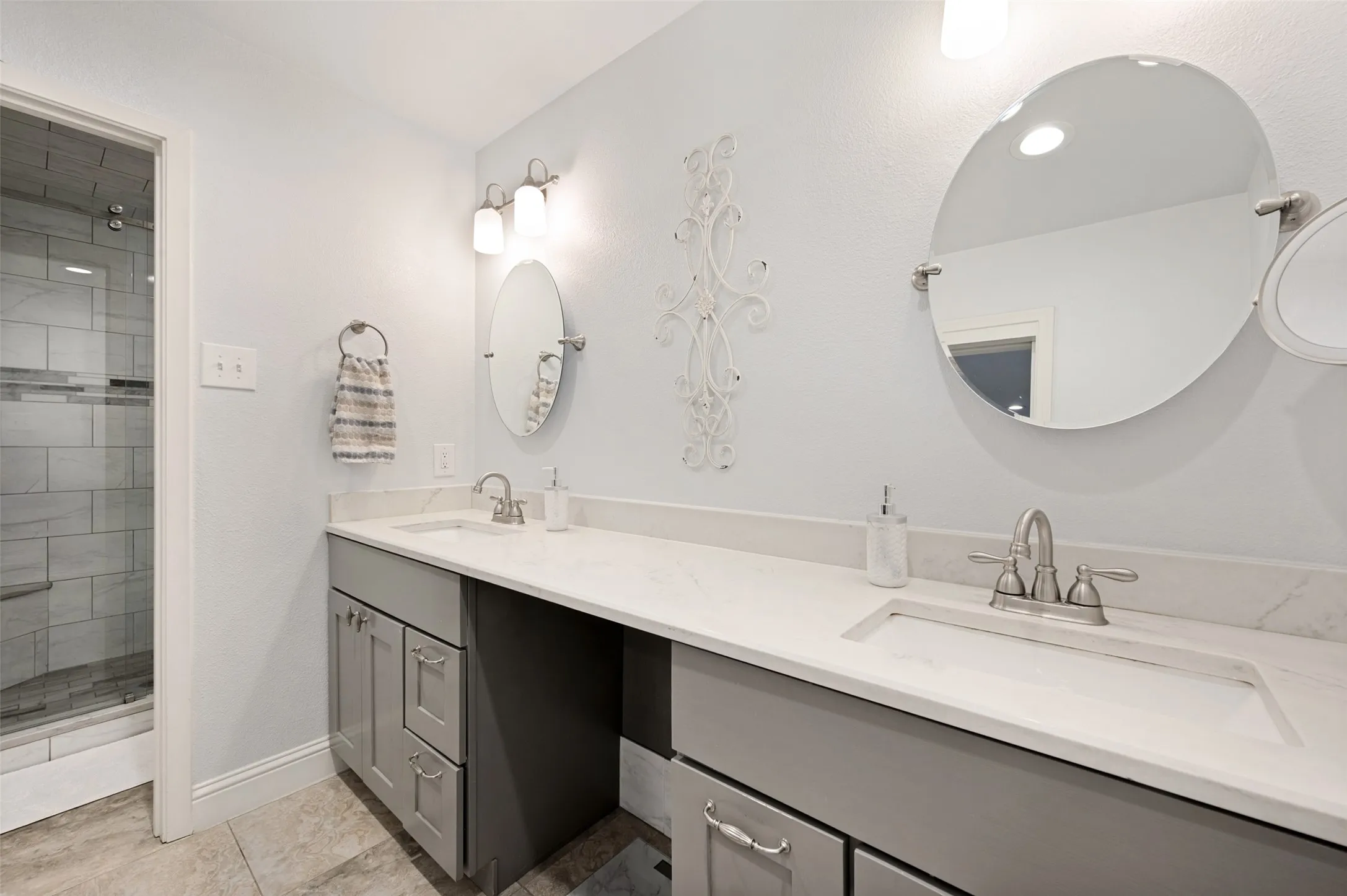 Dual sinks, separate shower