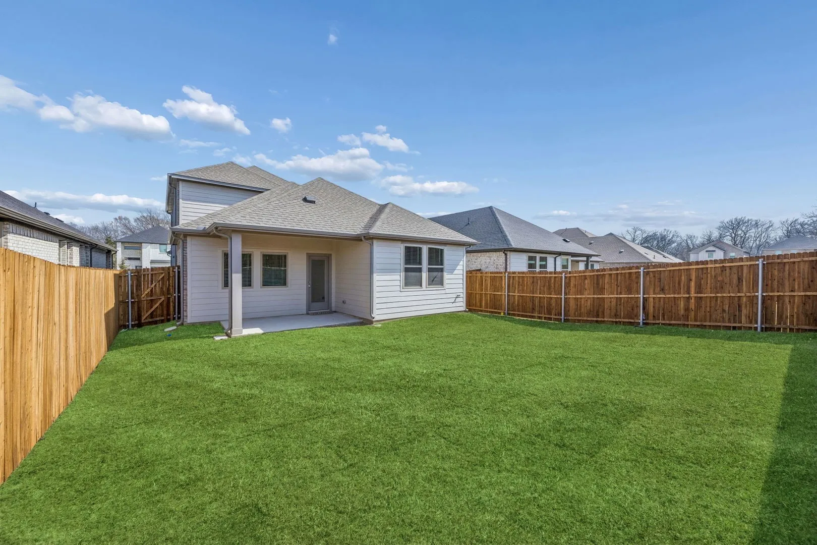 Covered Patio in the Willow home plan by Trophy Signature Homes – REPRESENTATIVE PHOTO