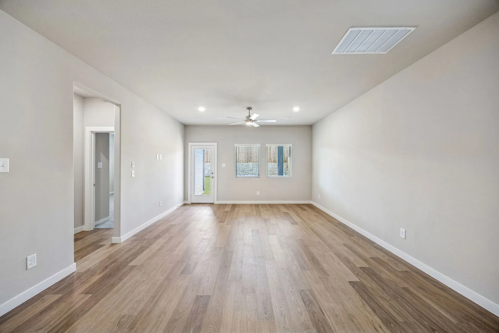 Living and Dining Room in the Willow home plan by Trophy Signature Homes – REPRESENTATIVE PHOTO