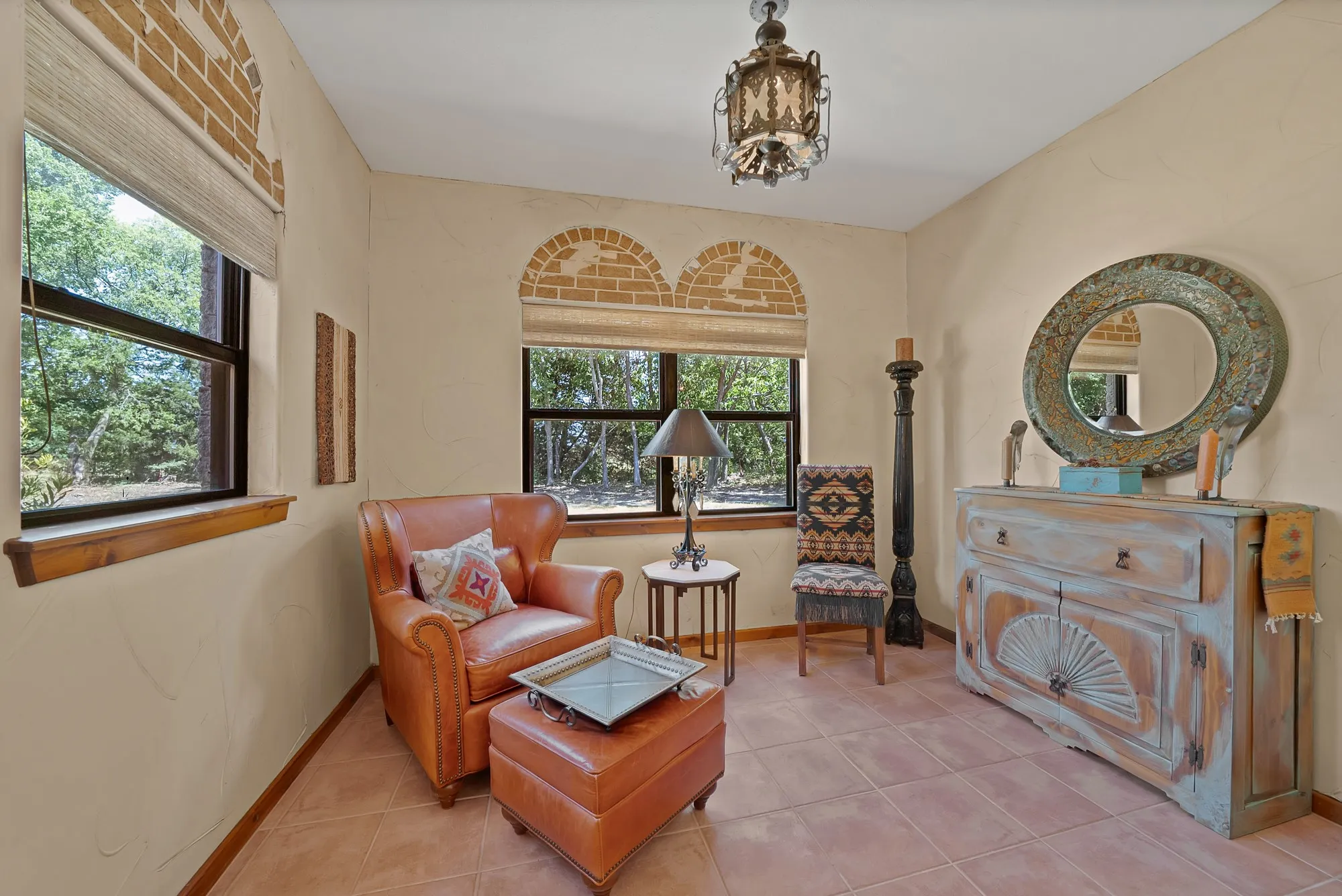 Sitting room off of the primary bathroom. Could also be used as an exercise room.