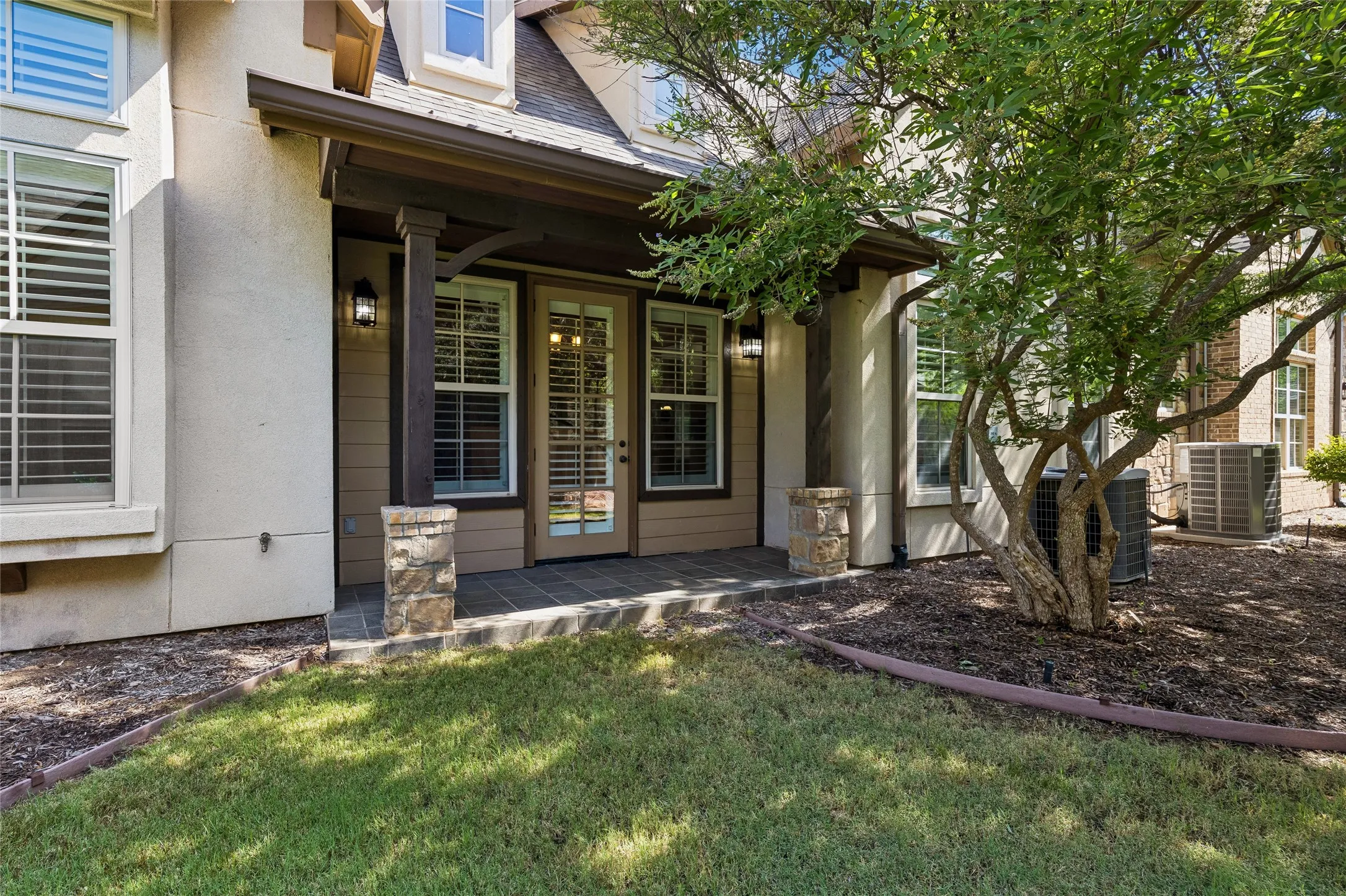 Back Covered Patio with Entrance to Home