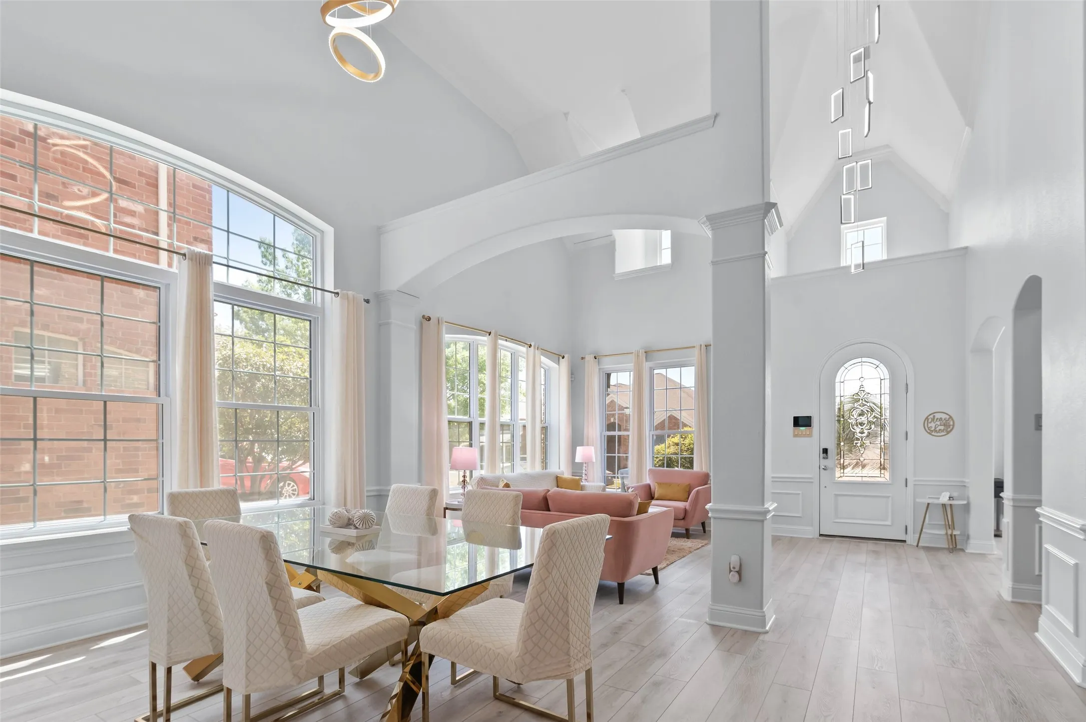Upon entering the home, you’re bathed in natural light and surrounded by soaring ceilings, architectural curves and modern chandeliers that will evoke a feeling that youve stepped into a room you might see in a designer magazine!