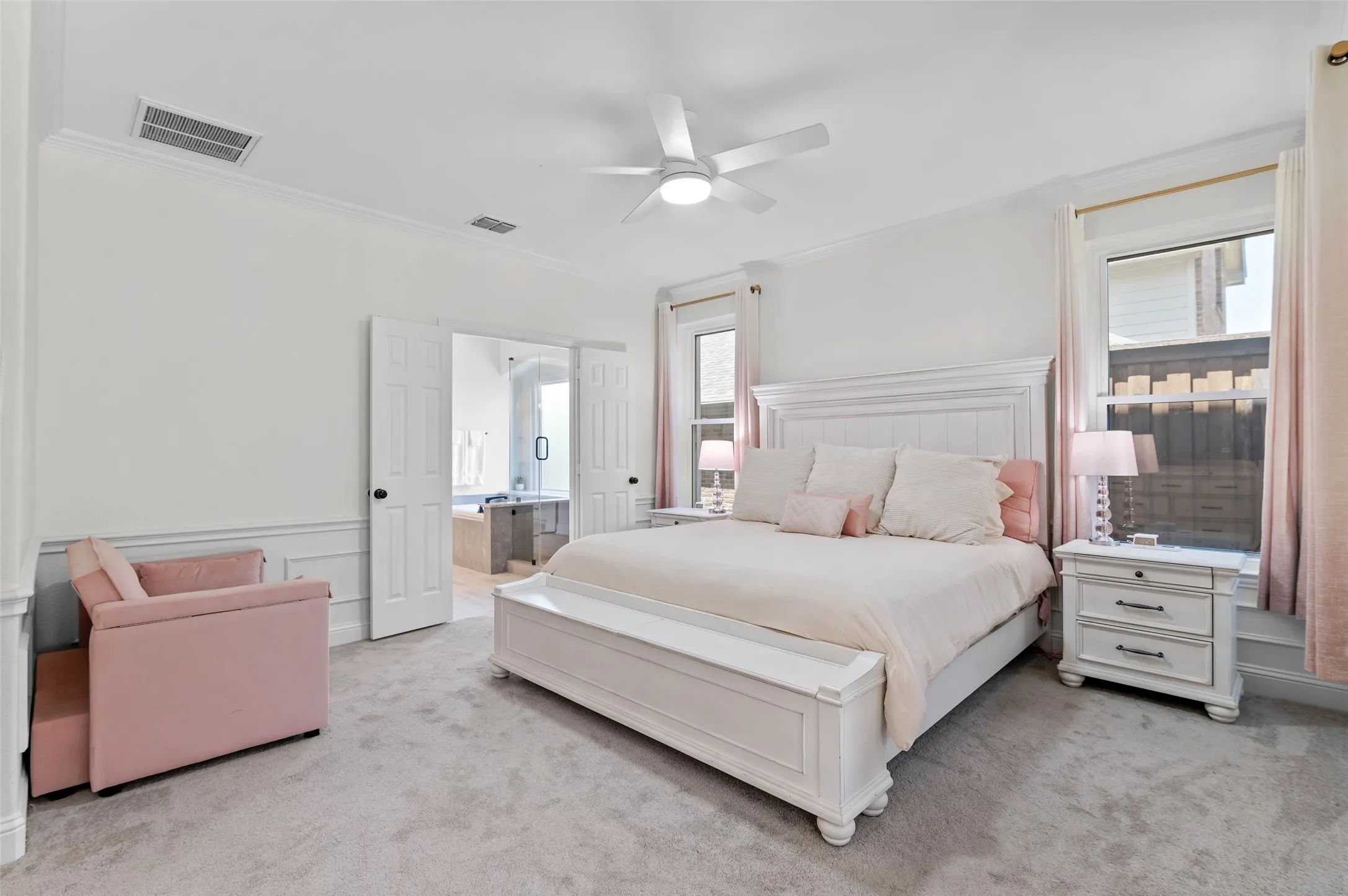 This primary retreat has it all!  Space for seating , a fireplace and direct access to the backyard!
