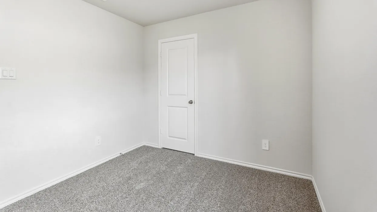 Neutral wall color and gray carpet flooring