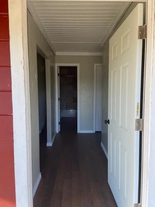 Wood-finish flooring throughout