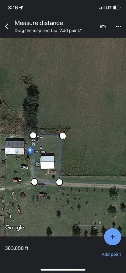 Satellite Imagery, Property Outline. Displaying a digital measurement of a property boundary with a recorded distance