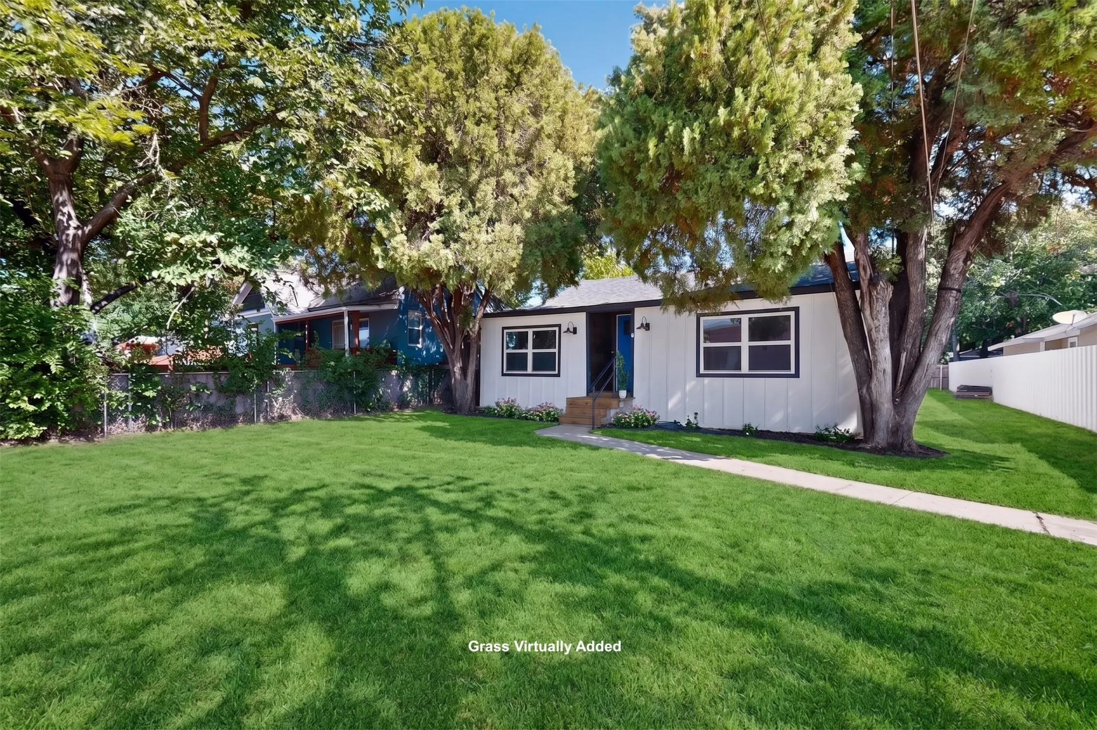 White exterior with dark trim windows