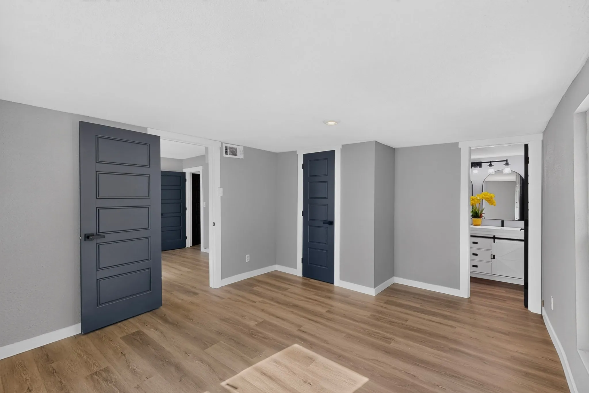 Light wood-finish flooring with neutral wall tones