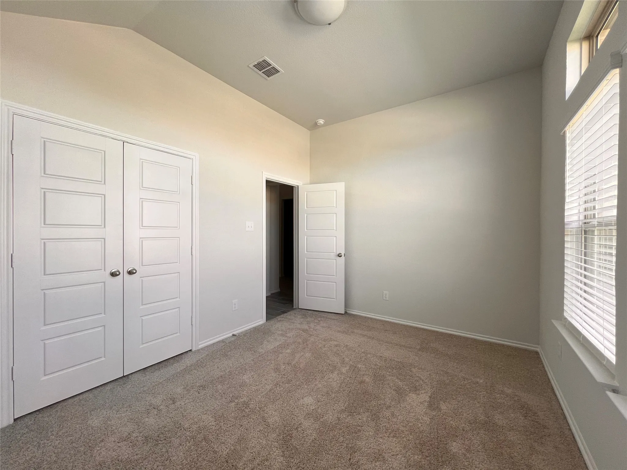 Front bedroom view towards door.