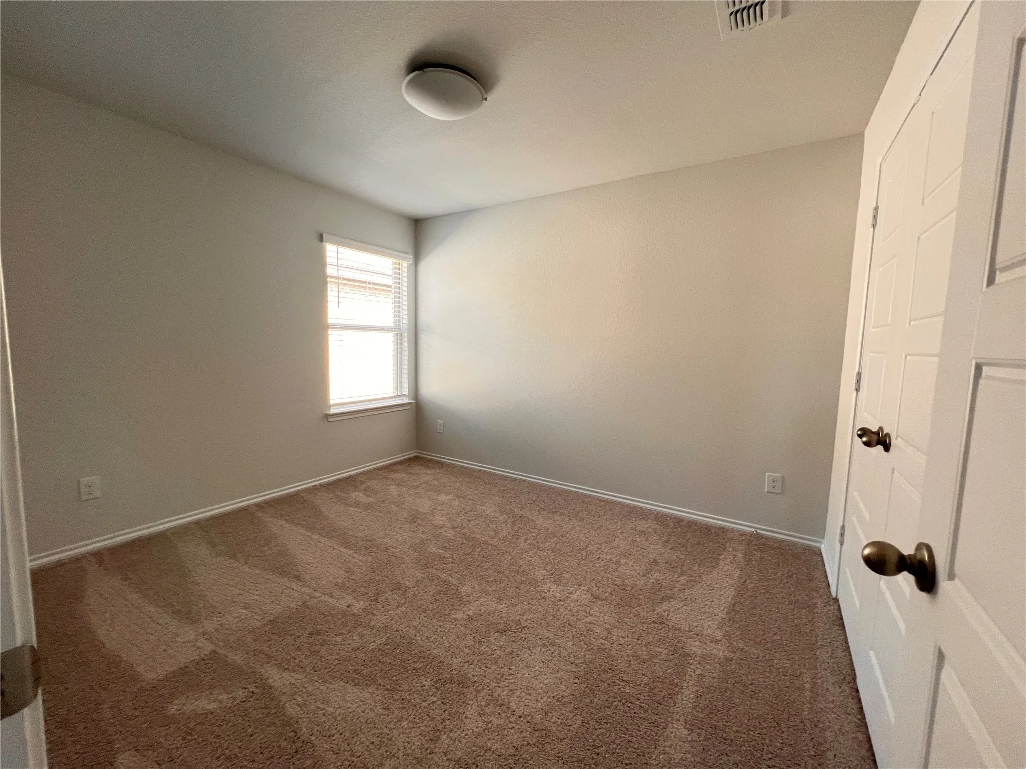 Middle bedroom, also oversized.