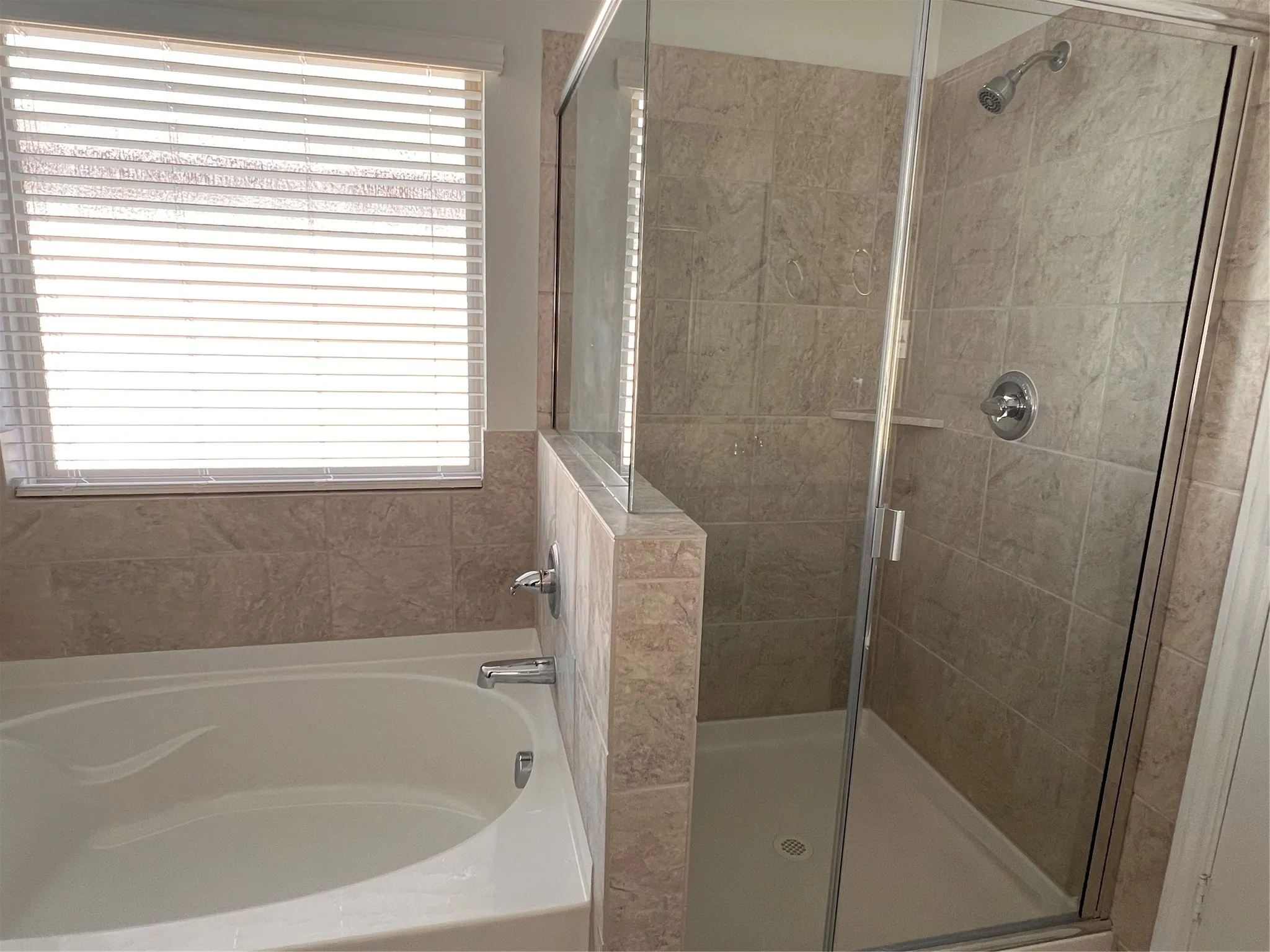 Separate tub and shower.