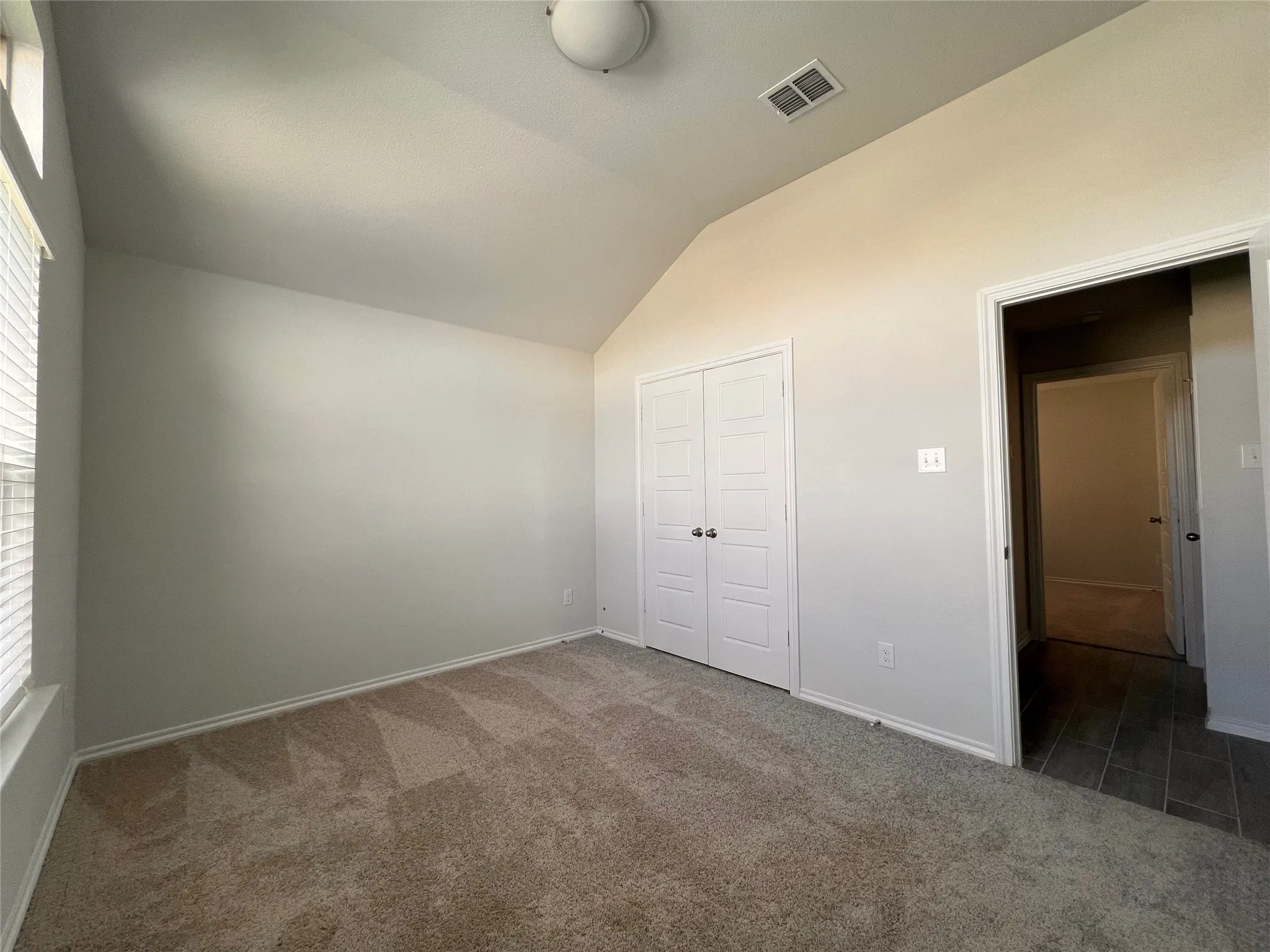 Front bedroom with bathroom behind the closet.