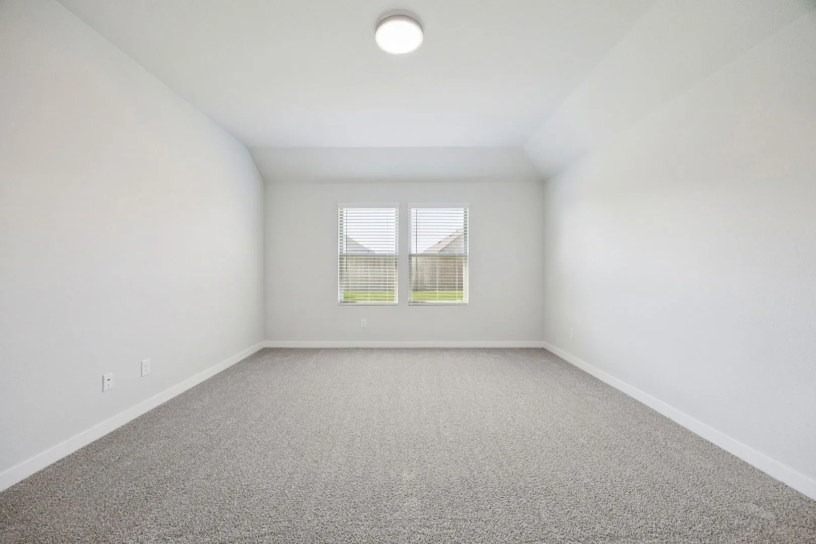 Primary Suite in the Heisman home plan by Trophy Signature Homes – REPRESENTATIVE PHOTO
