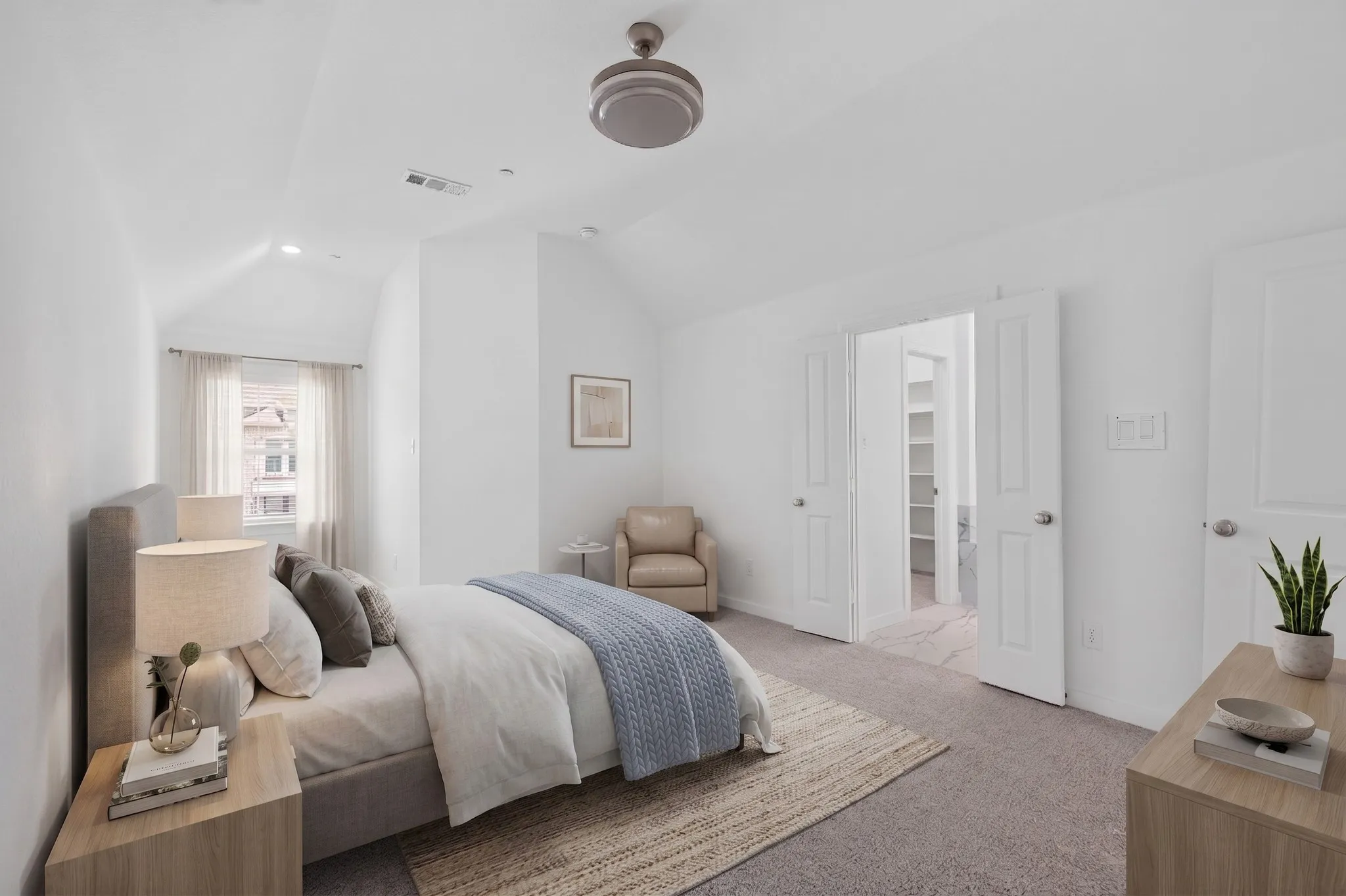 Vaulted ceiling with a flush-mount ceiling fan, recessed lighting, and a window with sheer drapes
