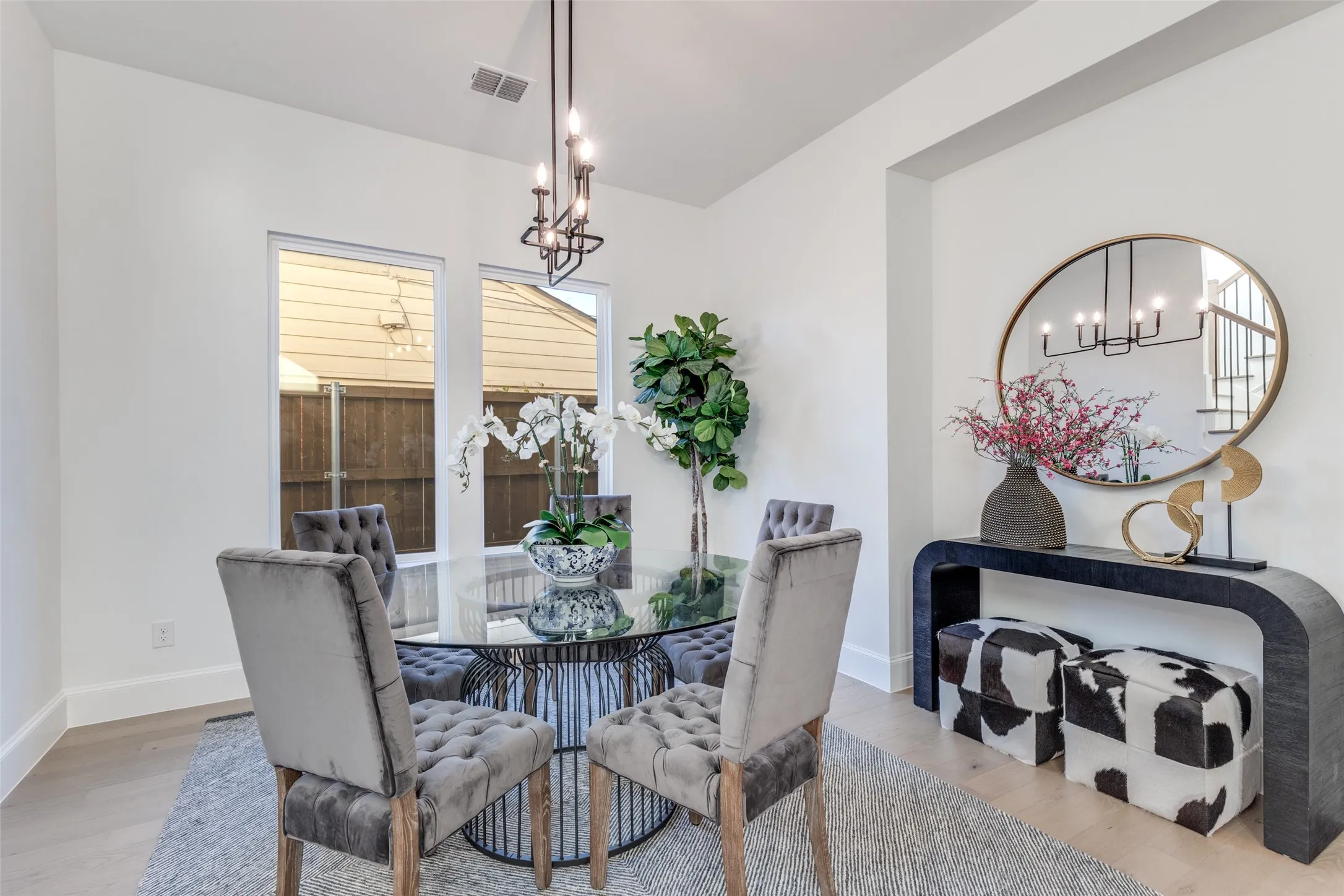 Breakfast/Dining area featuring a chandelier and light wood-style flooring