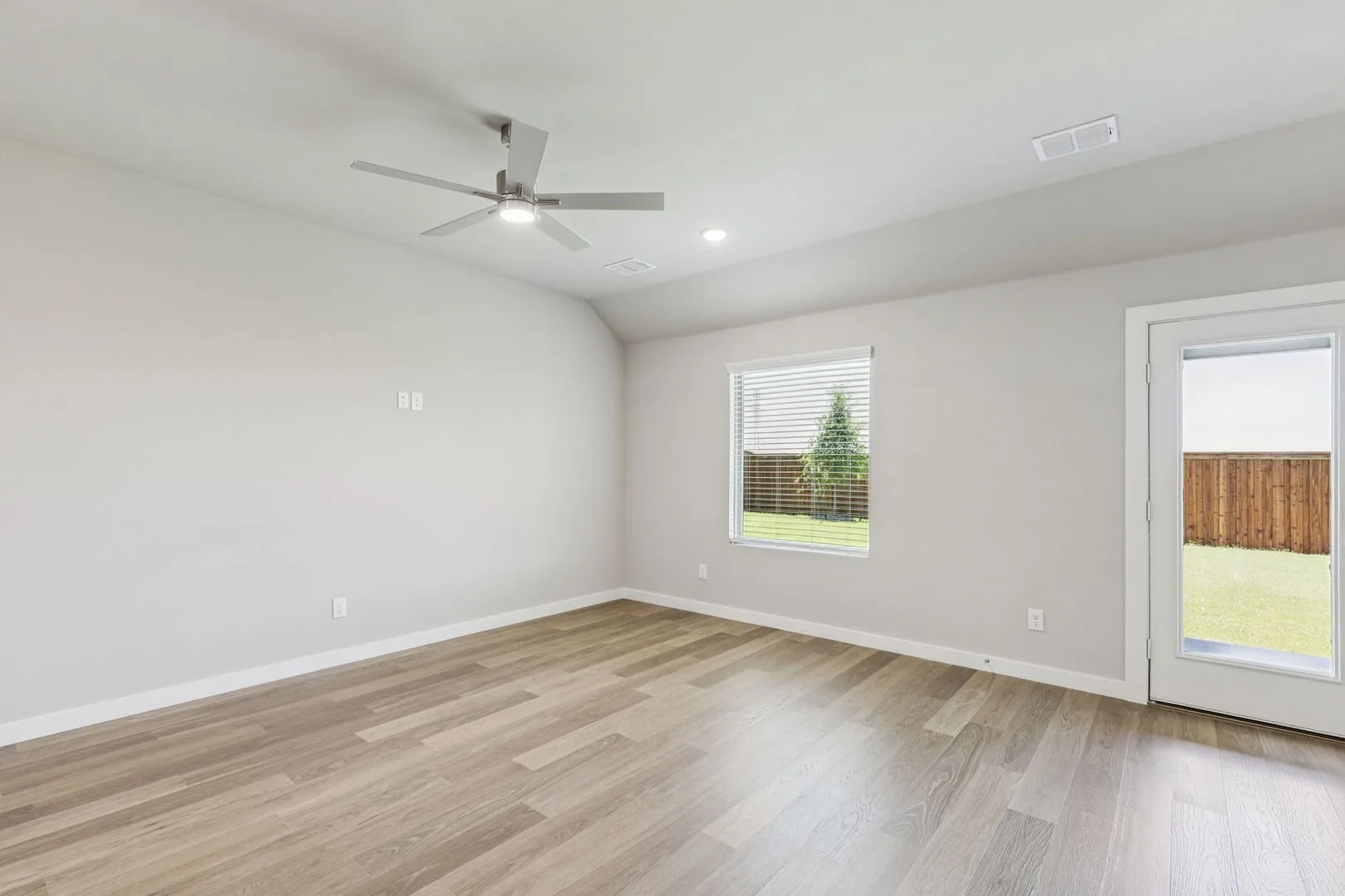 Living Room in the Harper home plan by Trophy Signature Homes – REPRESENTATIVE PHOTO