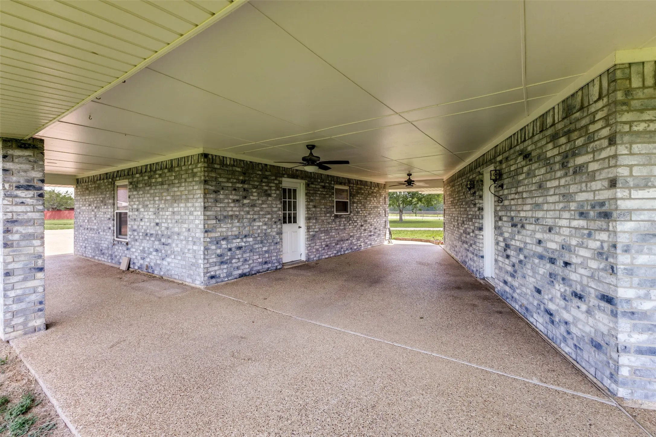 Amazing back patio is 48‘ x 8‘ between home and garage