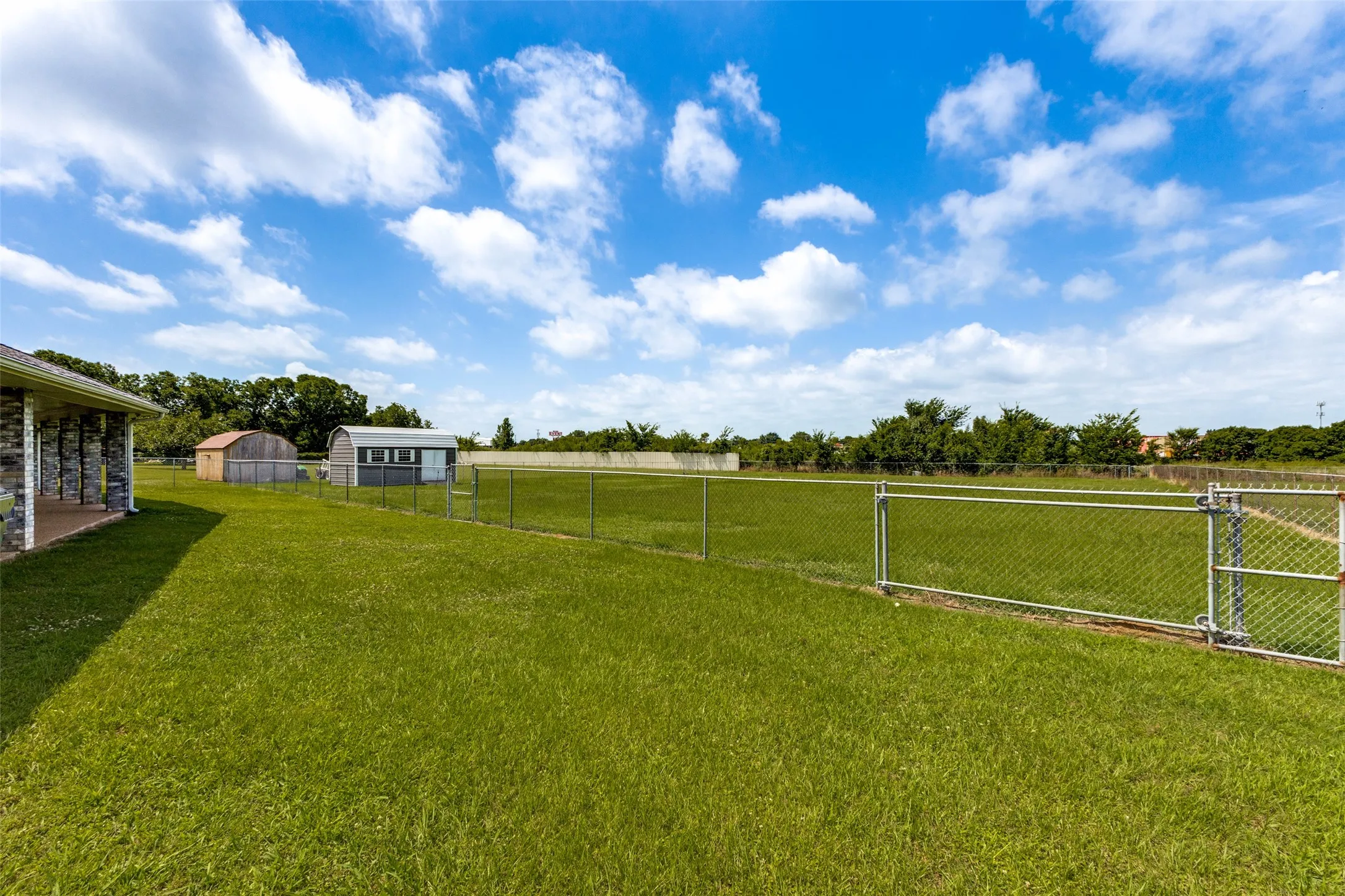 Both properties are completely fenced in- Storage building with loft