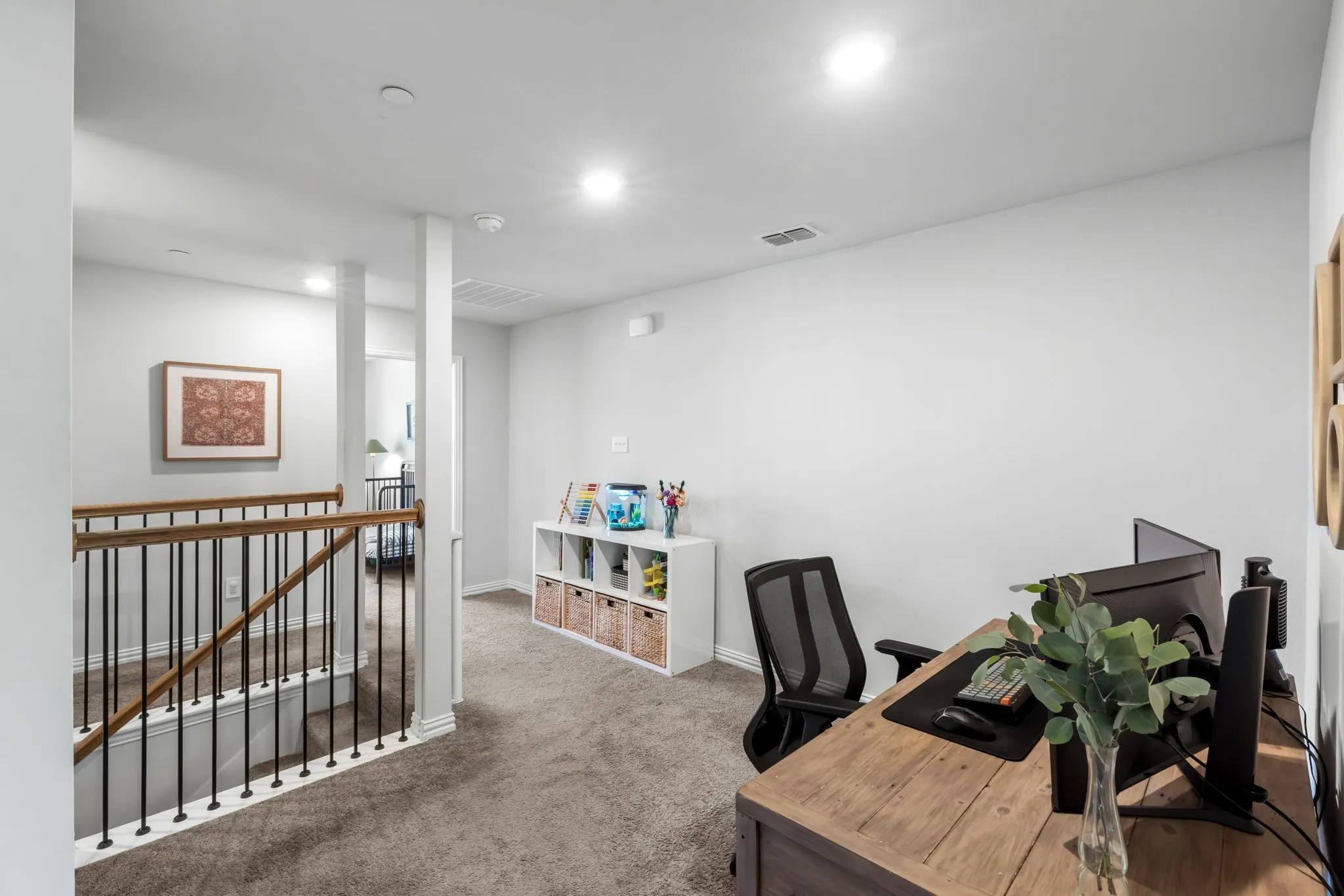 Versatile upper-level space featuring polished concrete flooring, recessed lighting, and white walls
