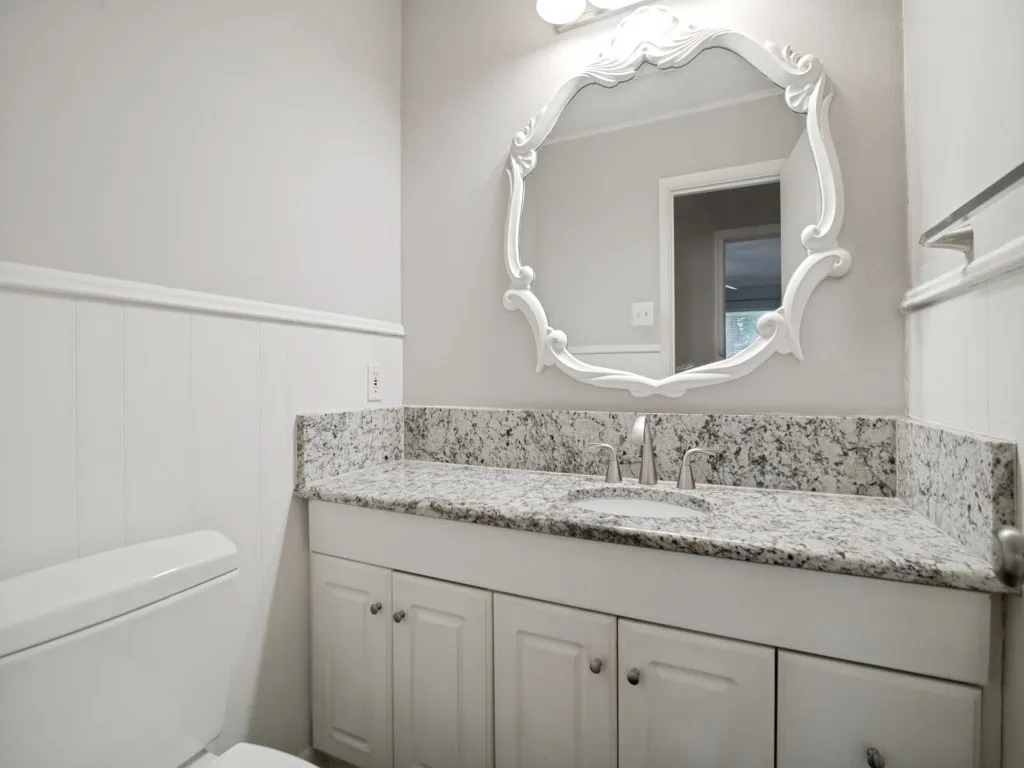 Half bath conveniently located in the front hall