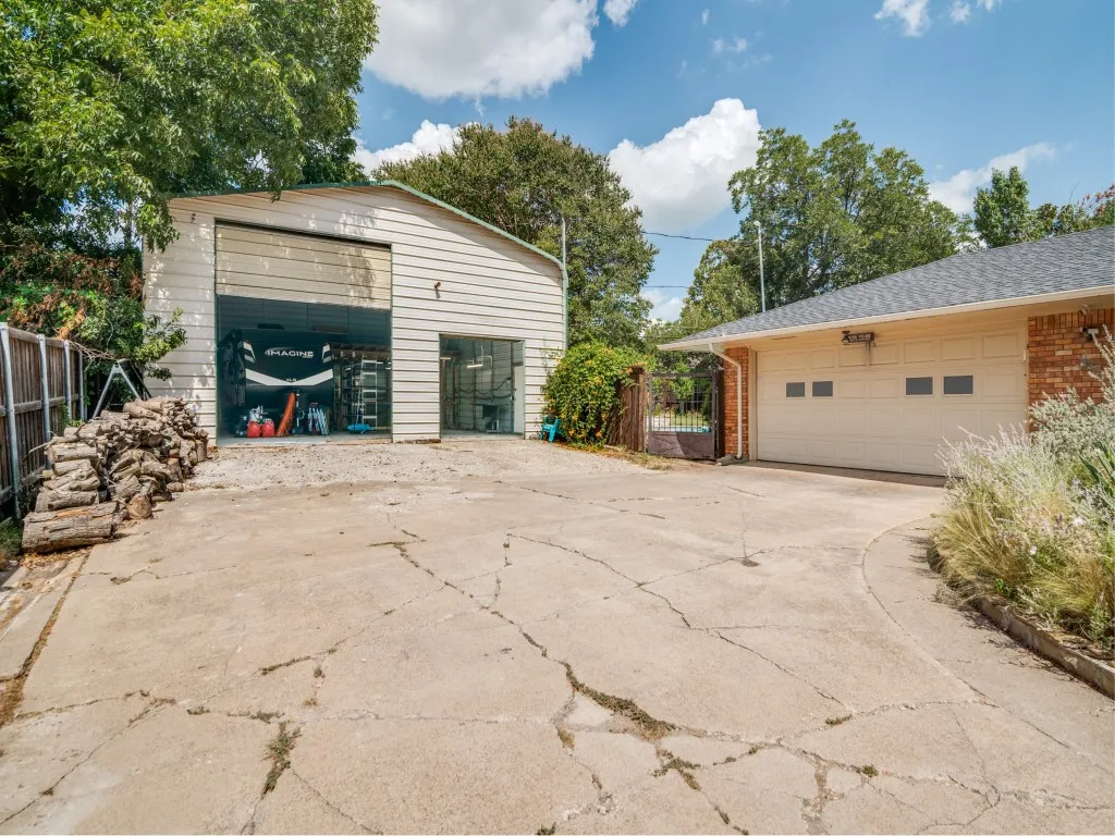 Spacious bonus garage with 14' tall door