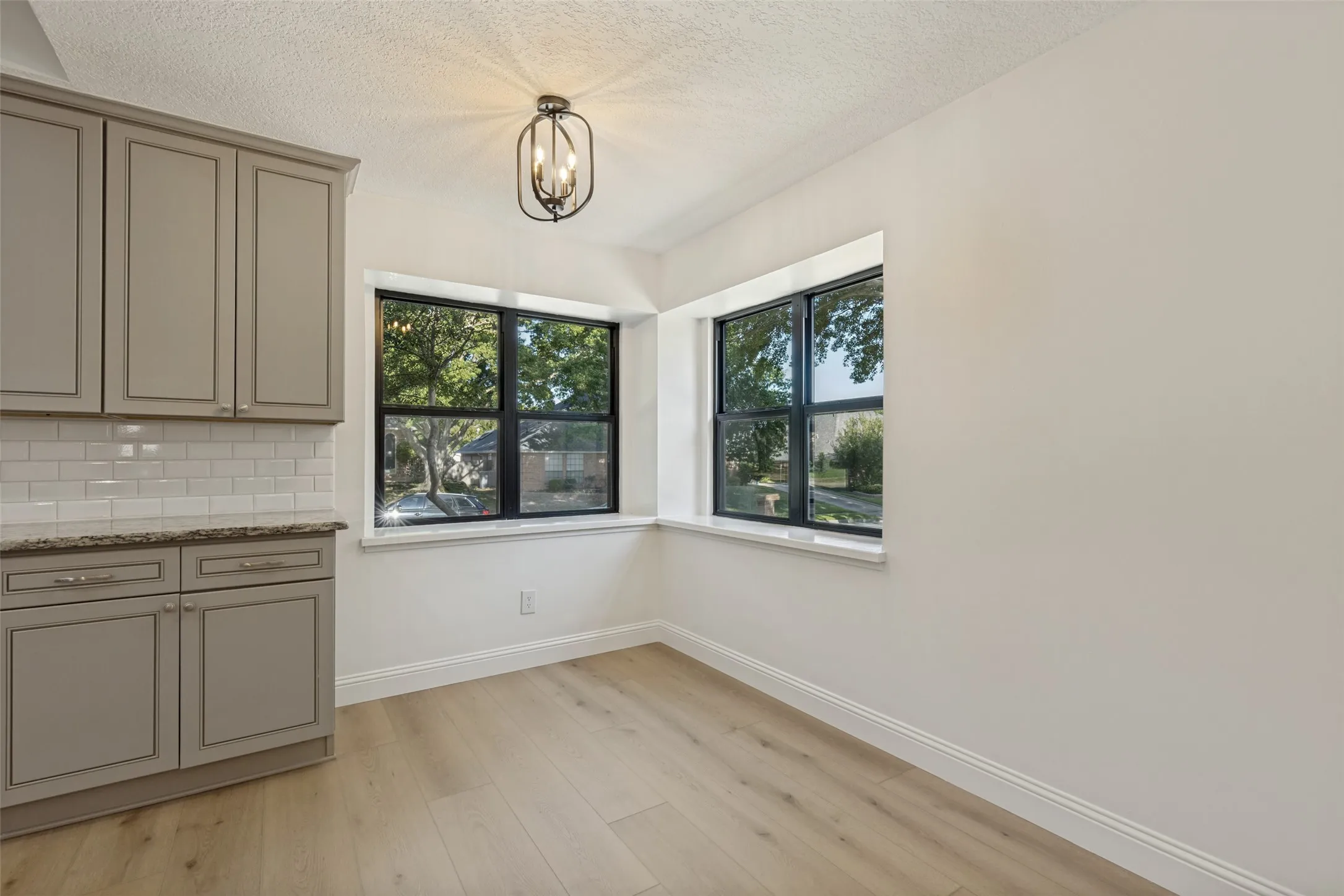 Breakfast Room with
Chandelier and Luxury Vinyl Plank Flooring