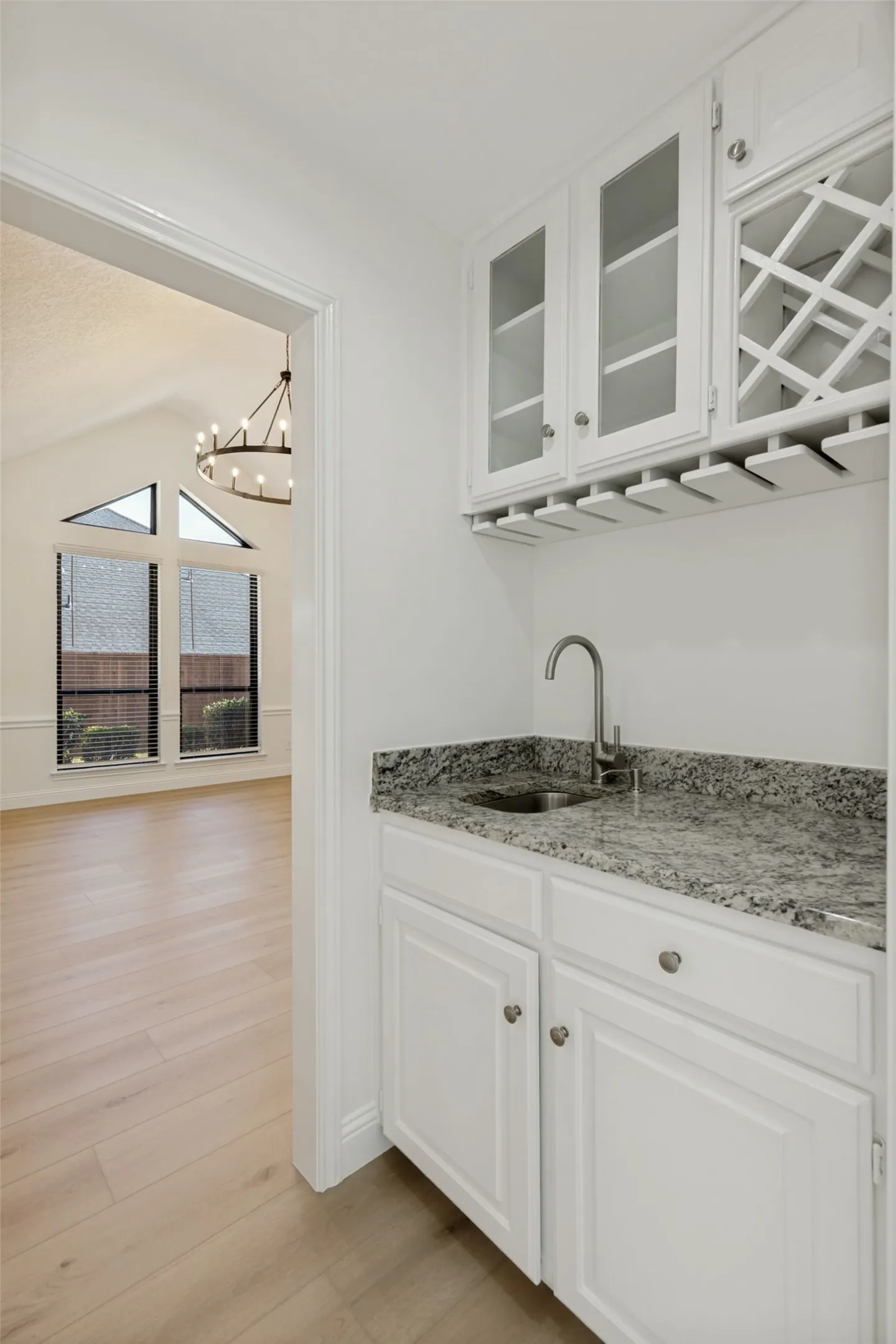 Wet Bar for Mixing Cocktails. Has a Built-in Wine Rack and Cabinetry for Bar Supplies