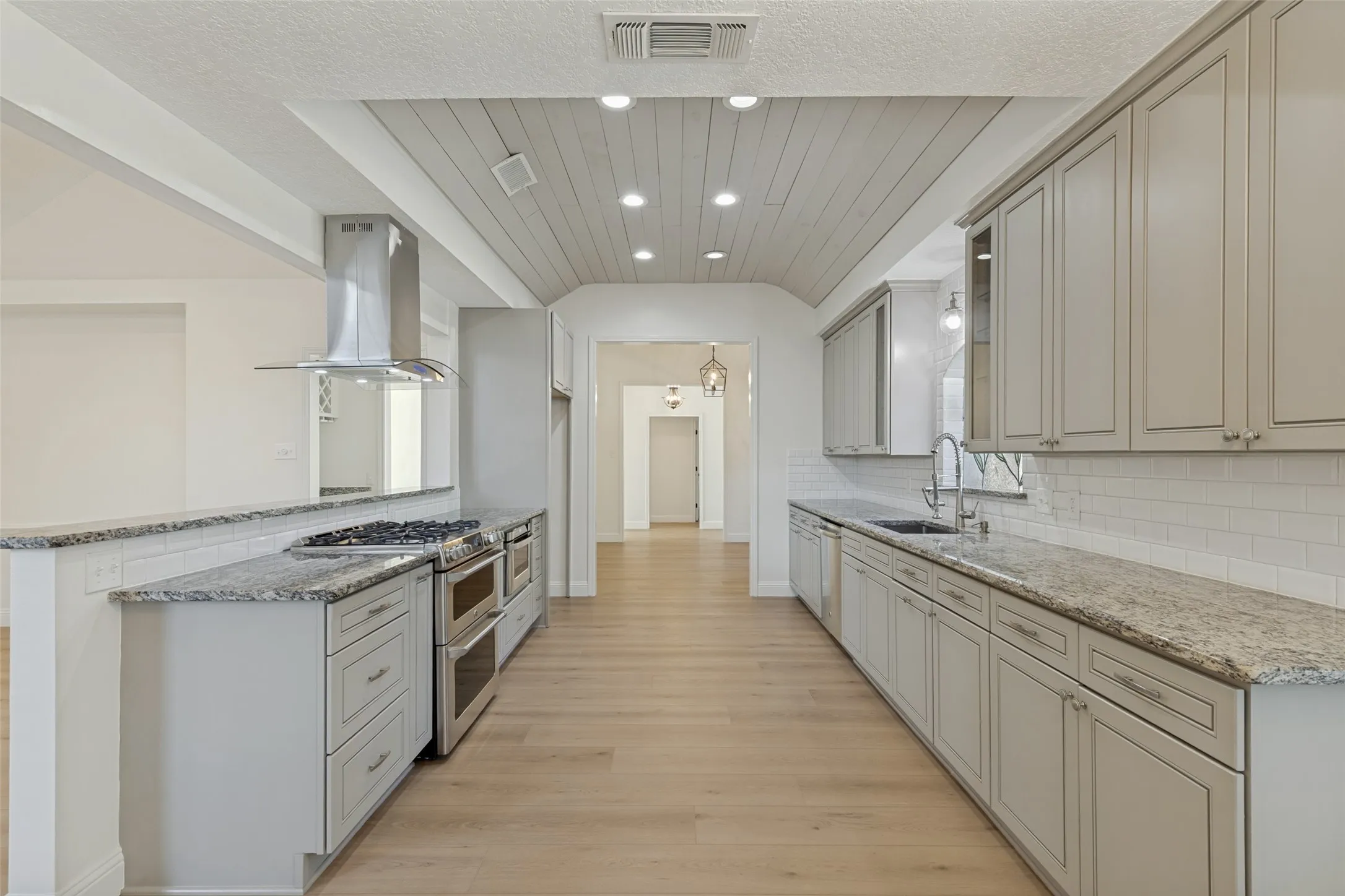 View of Kitchen from Breakfast Room looking towards the Formal Dining.