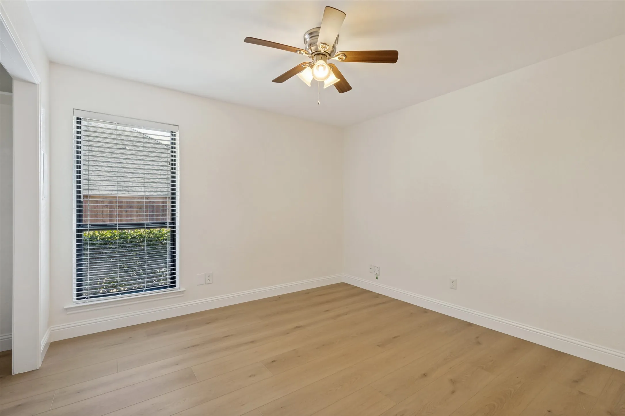 Fourth Bedroom with Ceiling Fan and Luxury Vinyl Plank Flooring