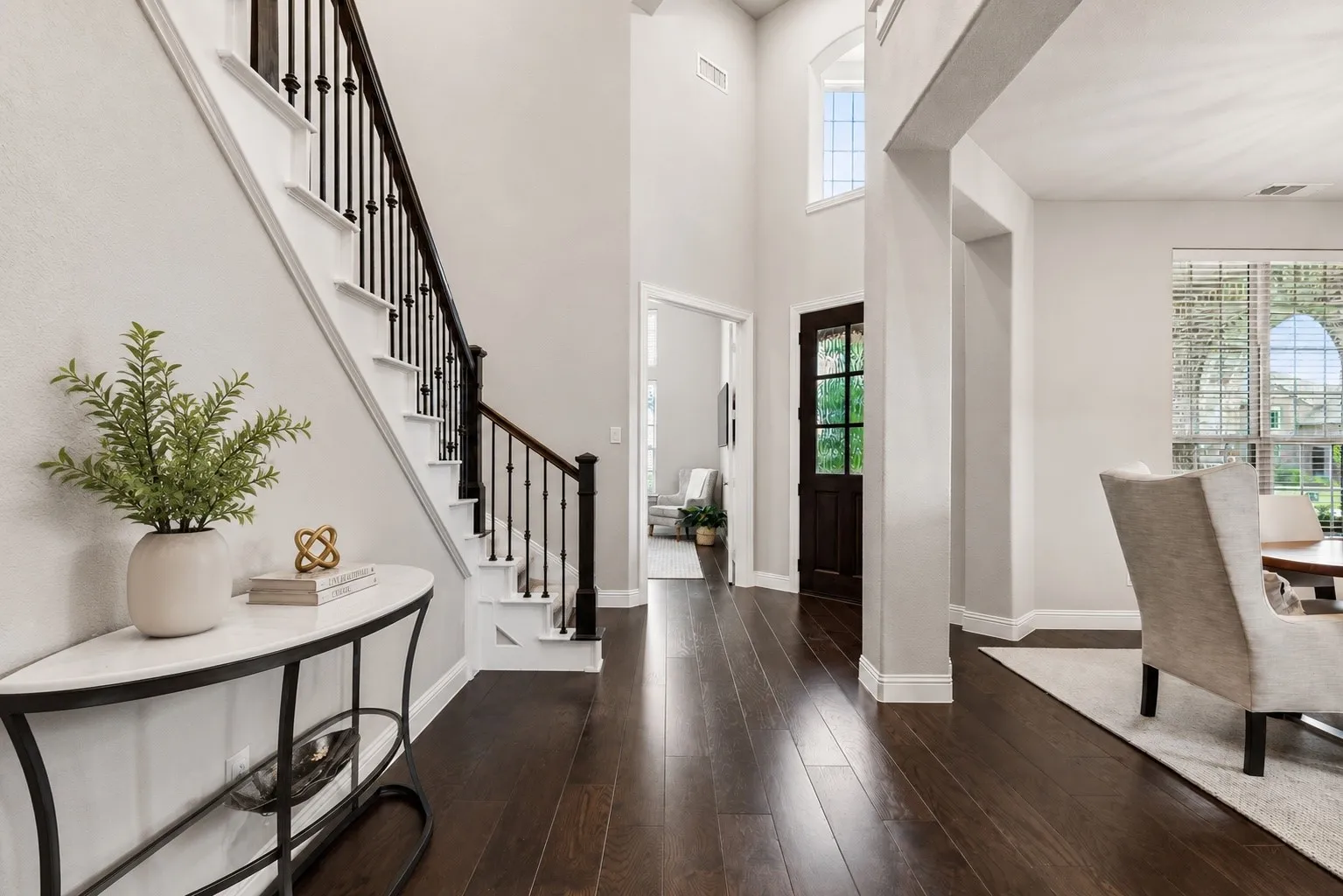 Refined Interior With Wood Flooring Throughout