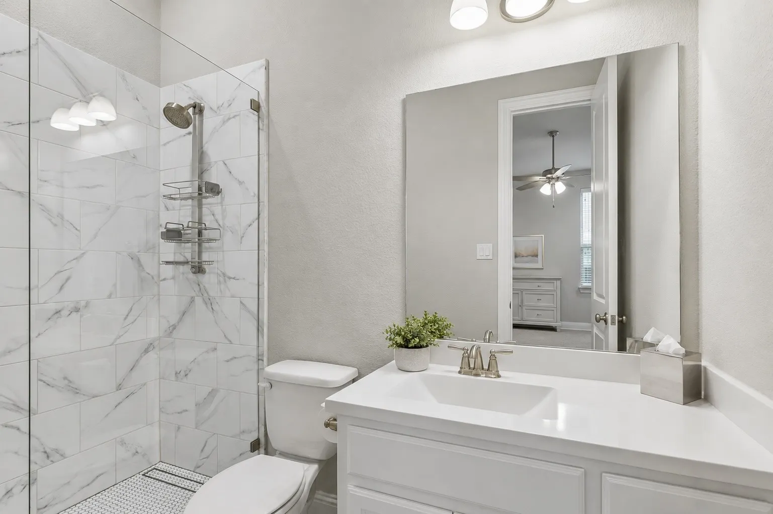 Custom Shower With Marble-look Tile and Frameless Glass