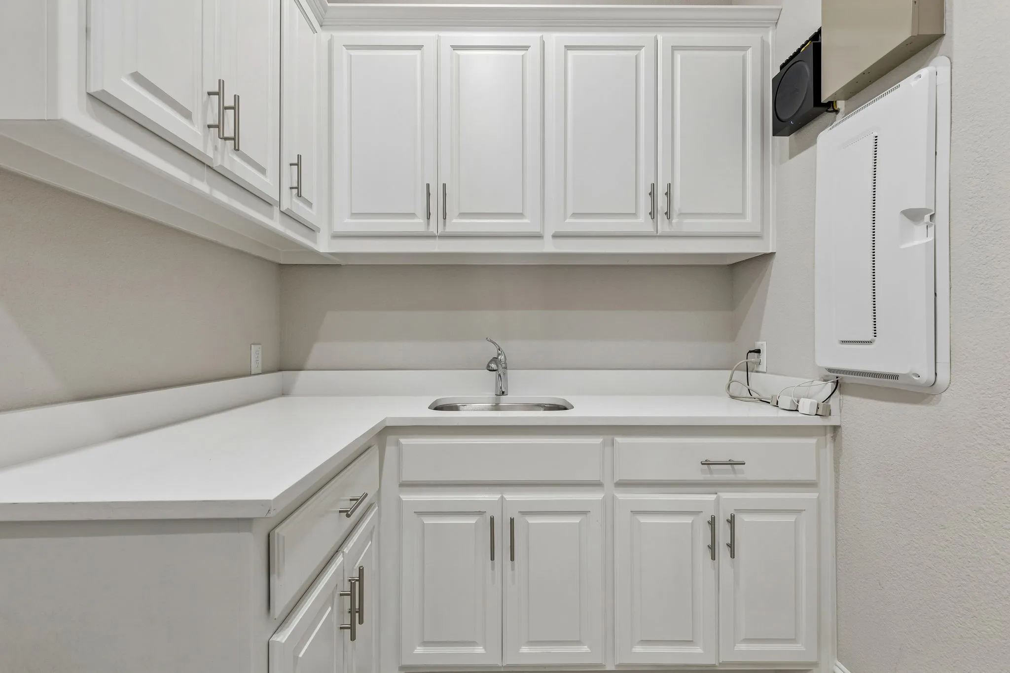 Large Laundry With Extra Cabinetry