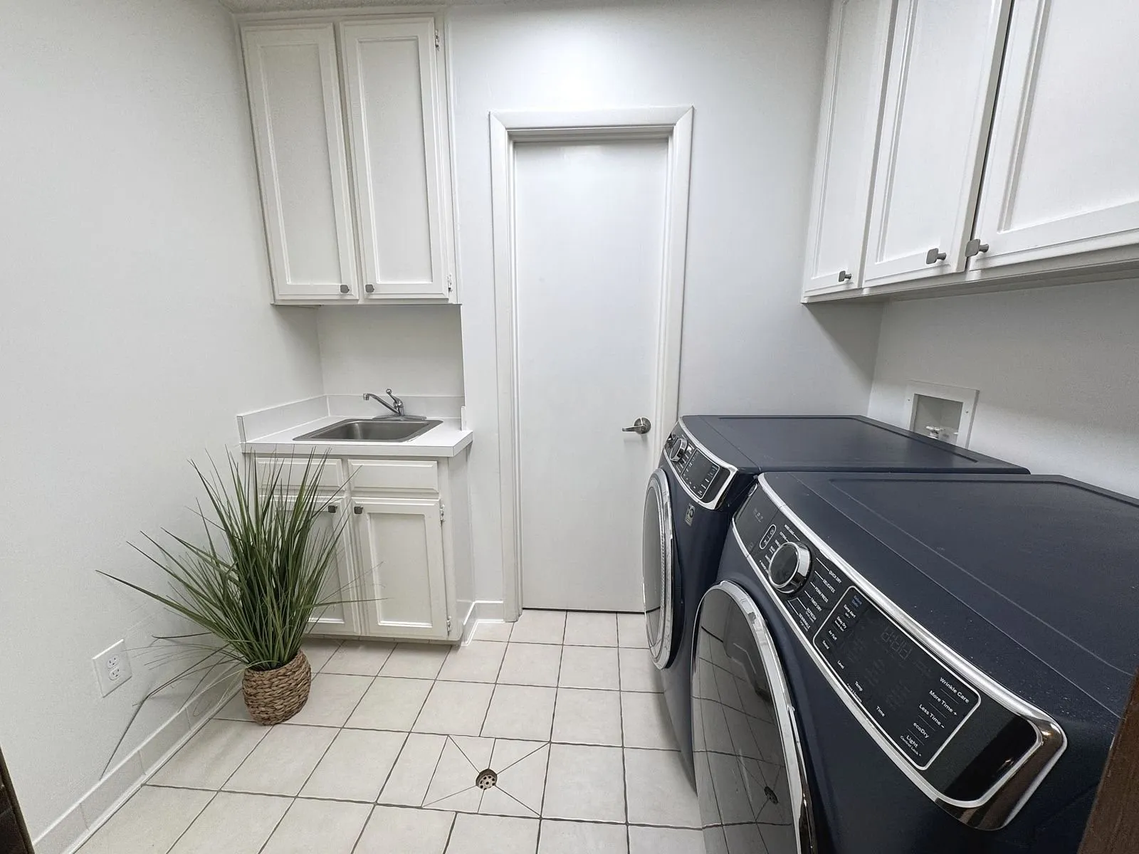 Room for freezer or extra refrigerator.