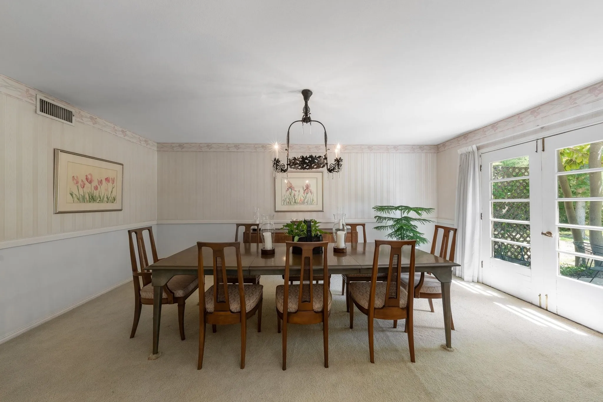 Dining Room with French doors for views of back yard.