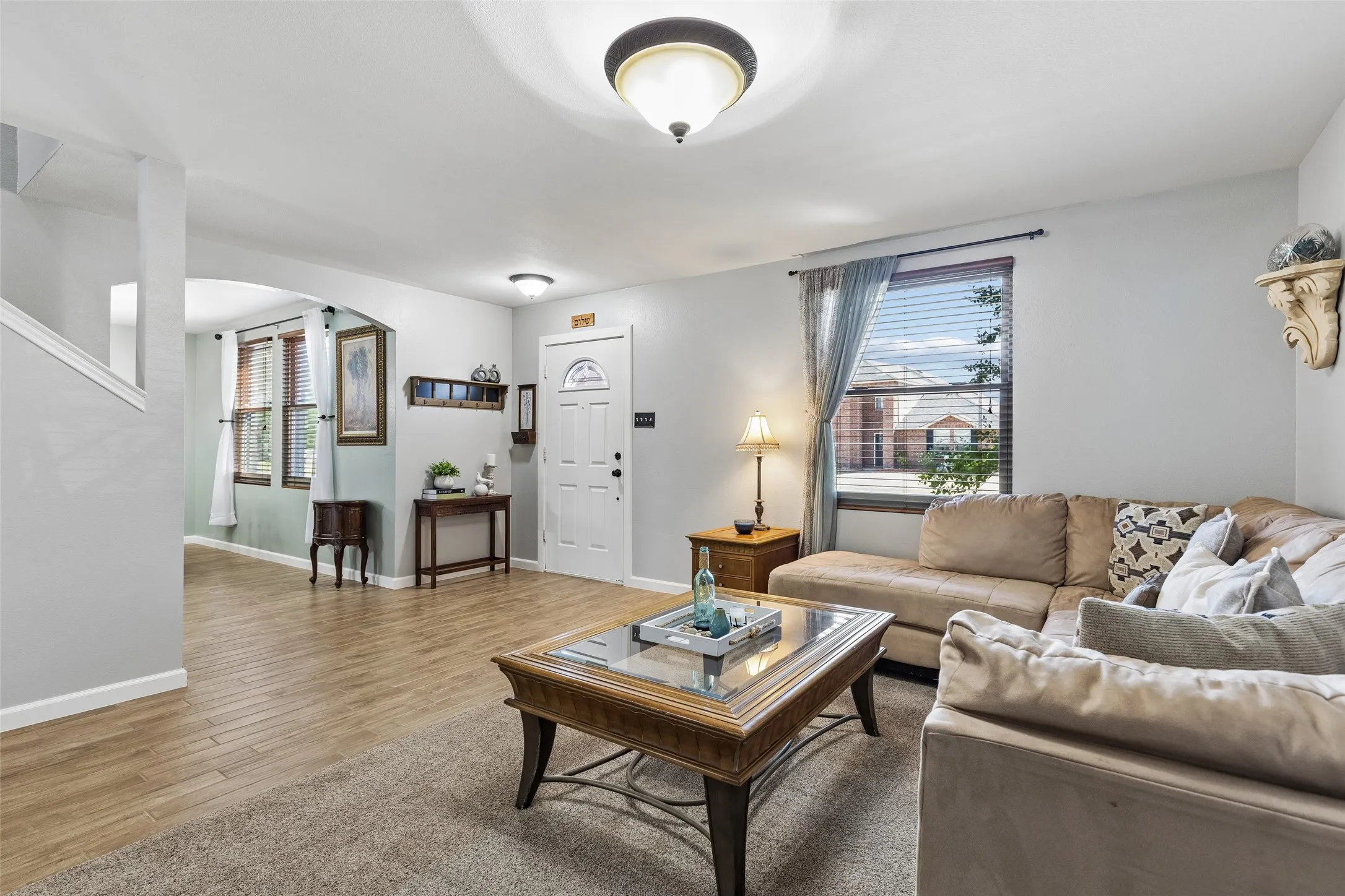 Bright, Open Formal Living – A large front window brings natural light into this spacious living area, while the open connection to the entry and adjoining dining room keeps the front of the home feeling connected and easy to move through.