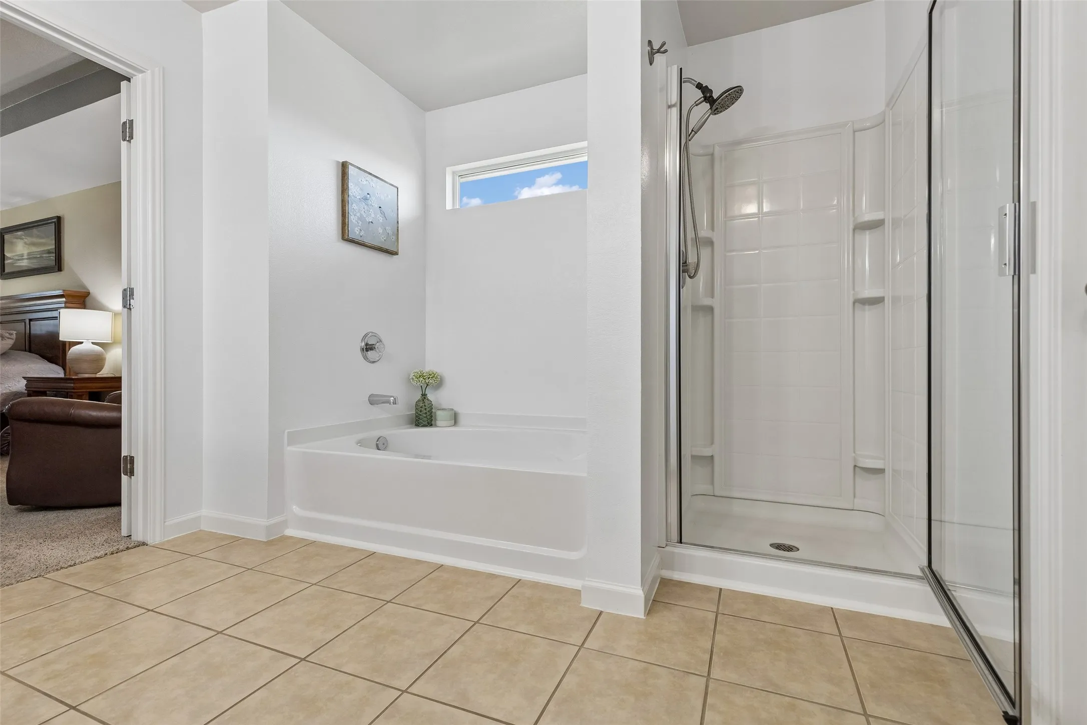 Separate Tub and Shower – The primary bath features a dedicated soaking tub and separate enclosed shower, giving you two distinct options for starting or ending the day.