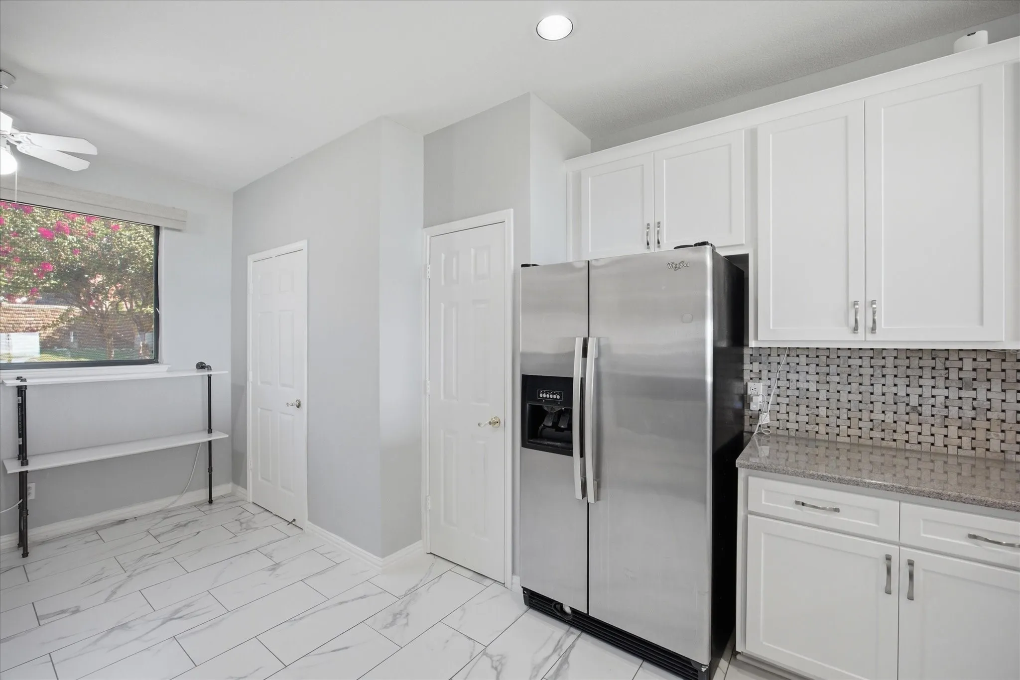 Kitchen includes breakfast area and pantry
