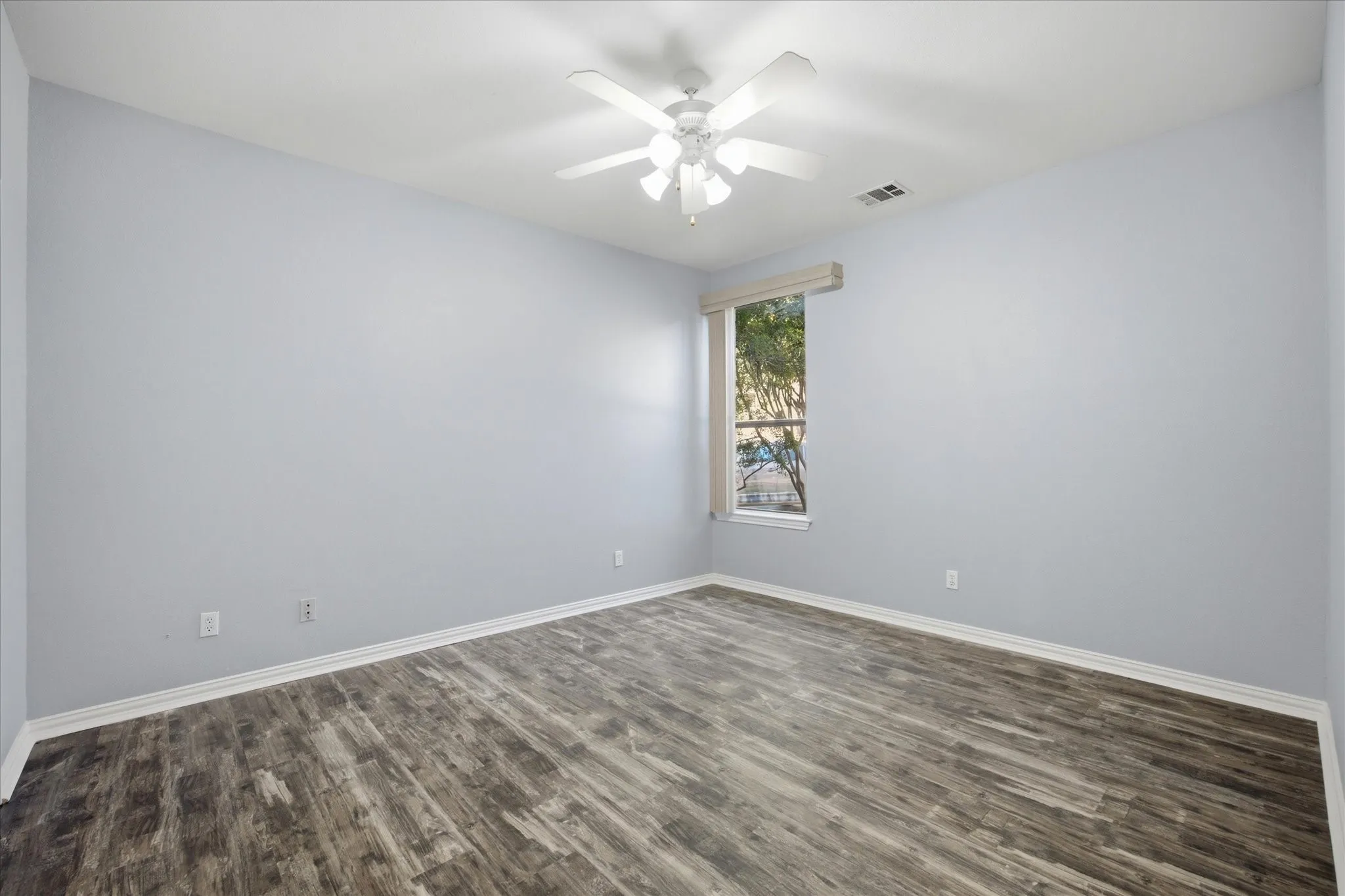 Spacious auxiliary bedroom includes roomy closet