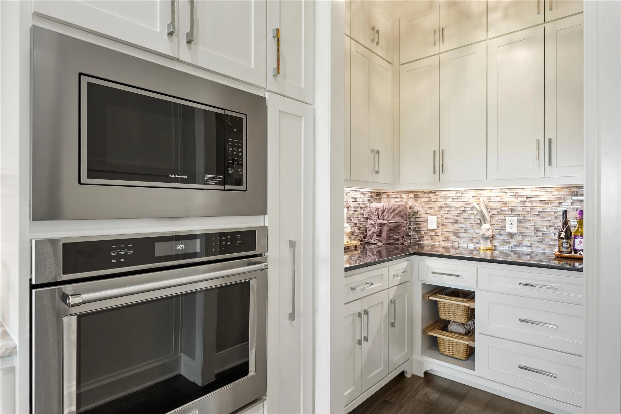 Adjacent butler’s pantry provides additional prep and serving space