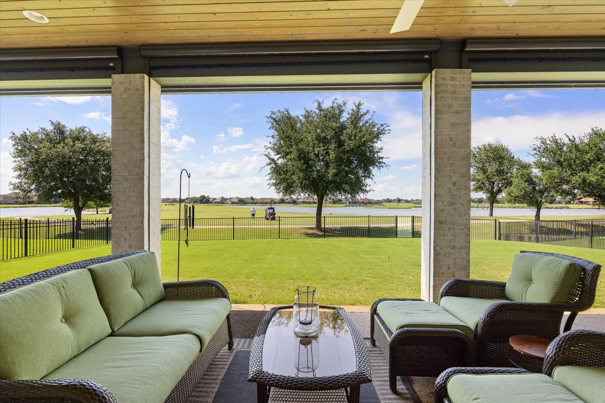 Year round amazing views of golf course and waterways.  Electric shades cover the full length of the patio areas.