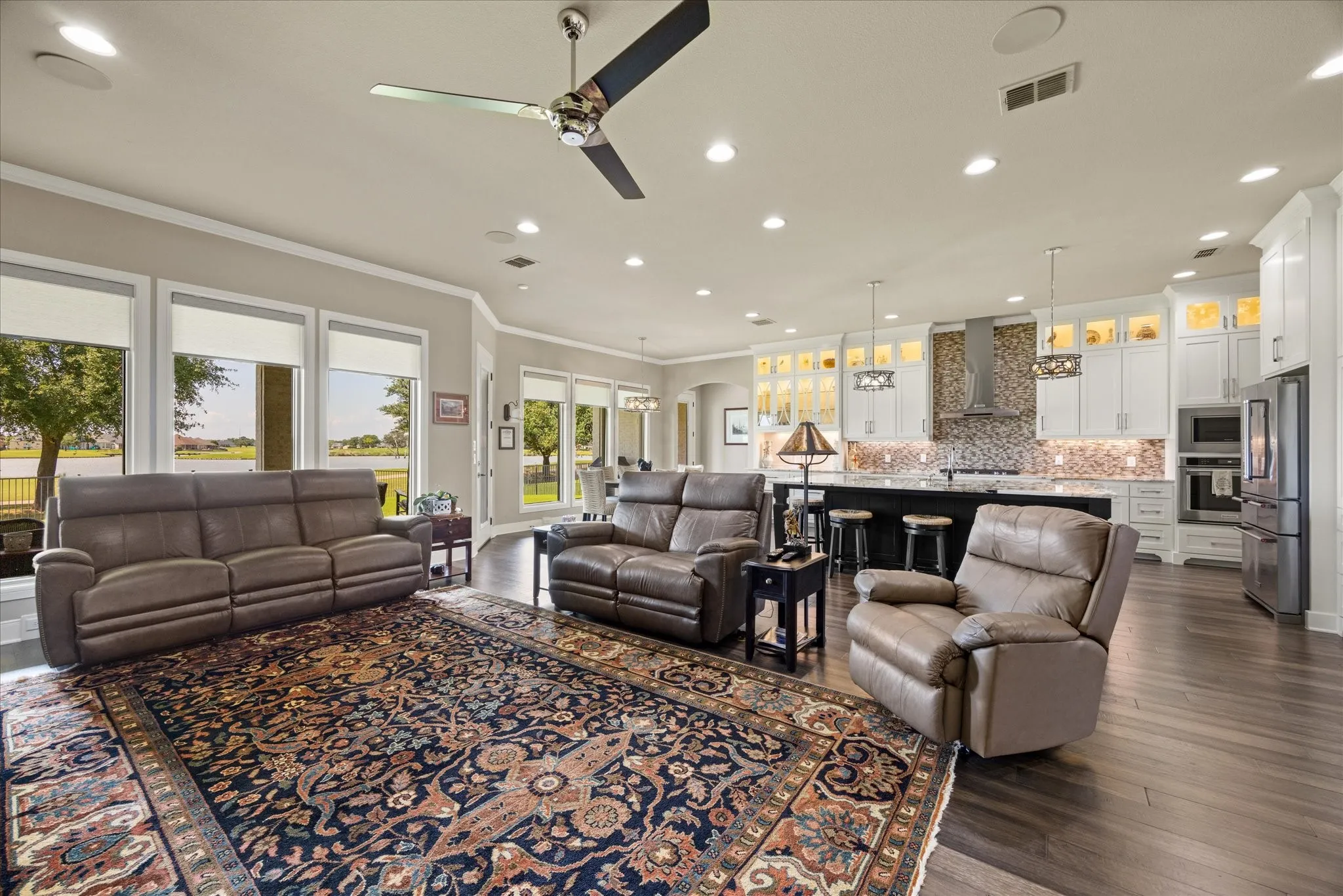 Light, bright, & open flexible floor plan with expansive views - electric shades for light control.