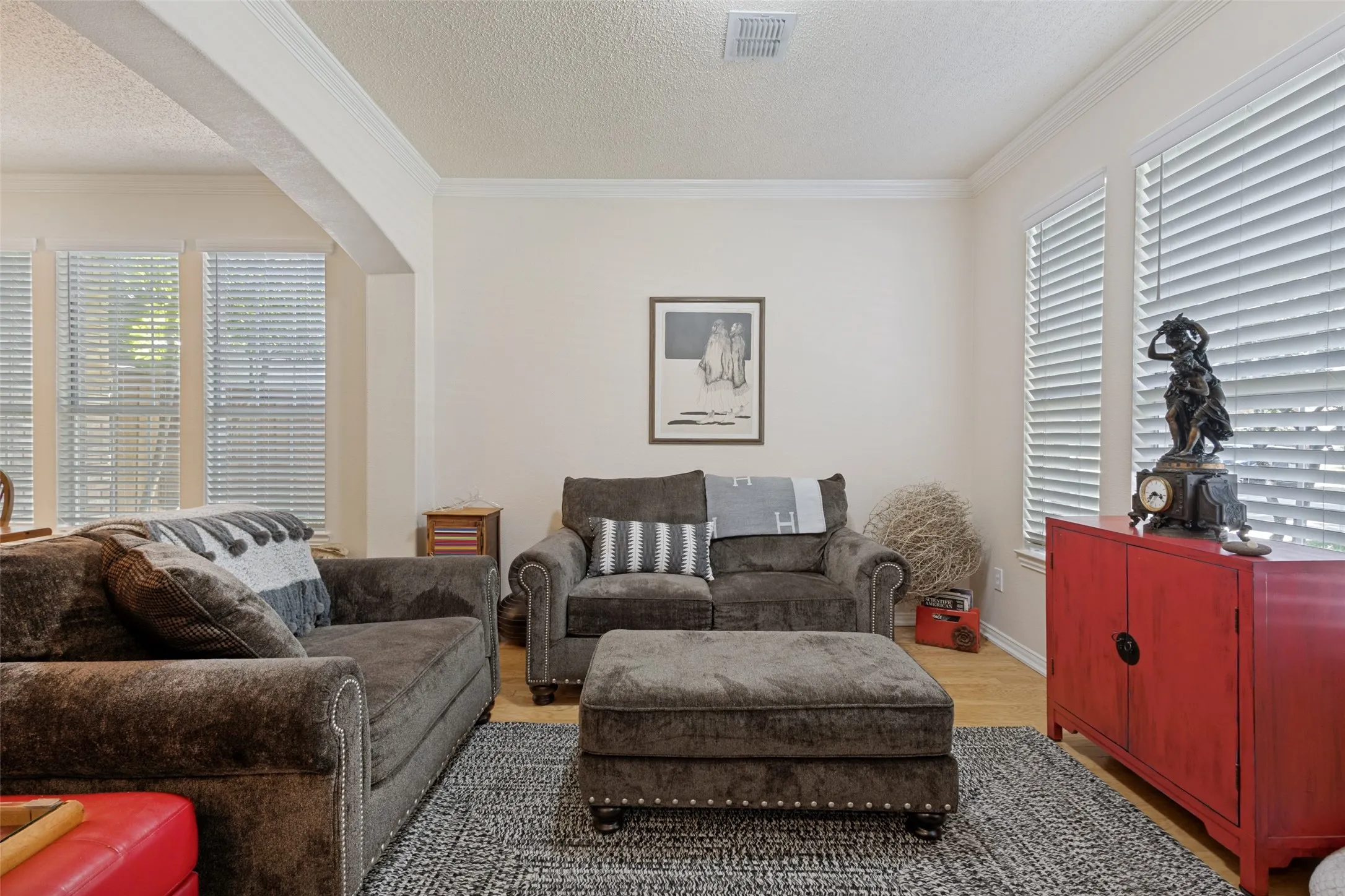 Stacked Formals have arch entries, hardwoods a great space for entertaining.