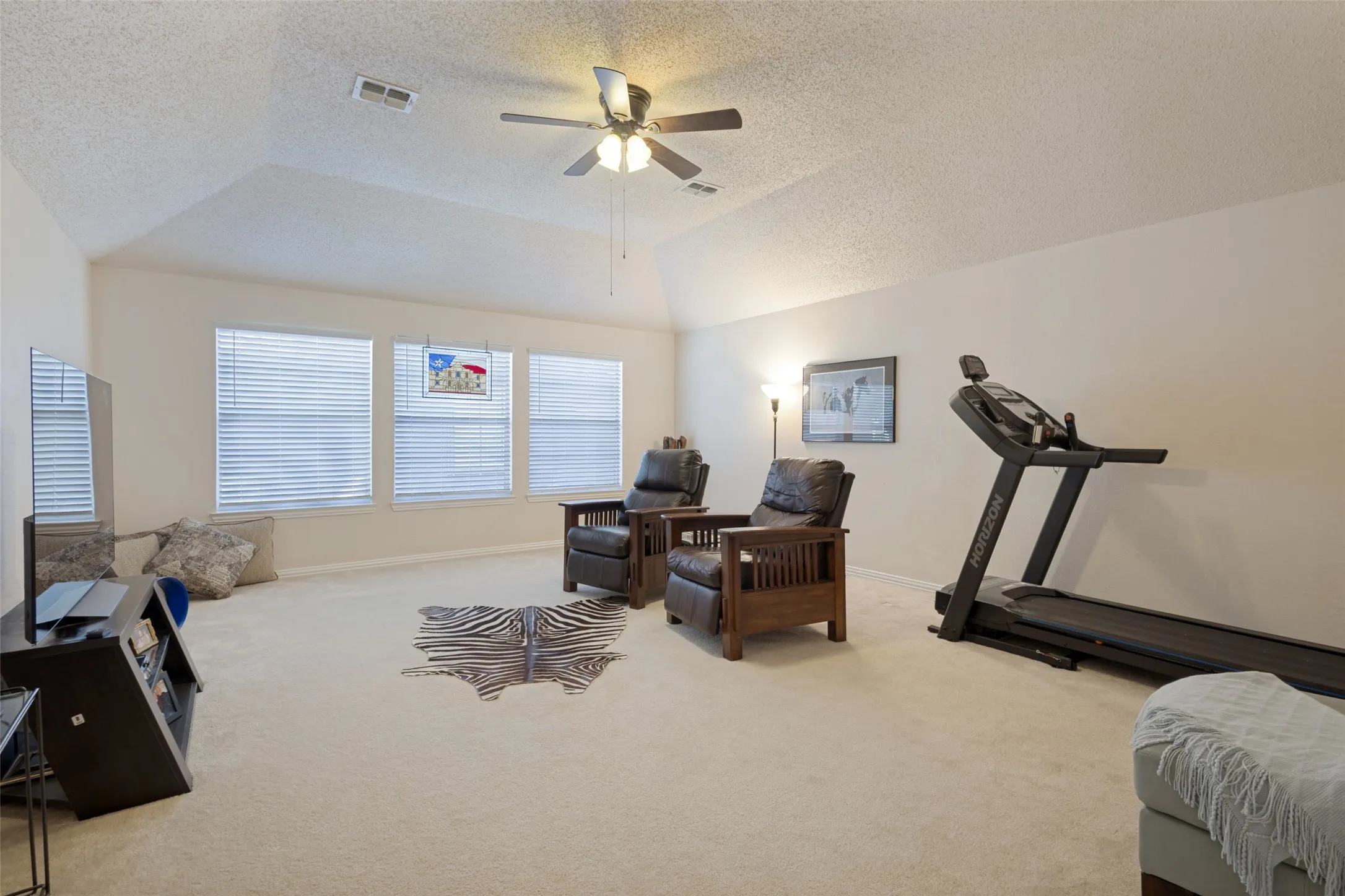 UPSTAIRS: The Gameroom is huge-space for media,pool table and exercise equipment.
(This could be remodeled for a 2nd primary bedroom easily).