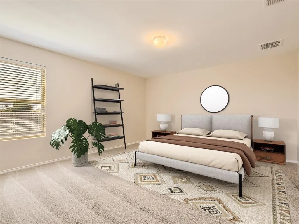 Wall-to-wall carpeting, window with horizontal blinds, built-in shelving unit, and overhead lighting